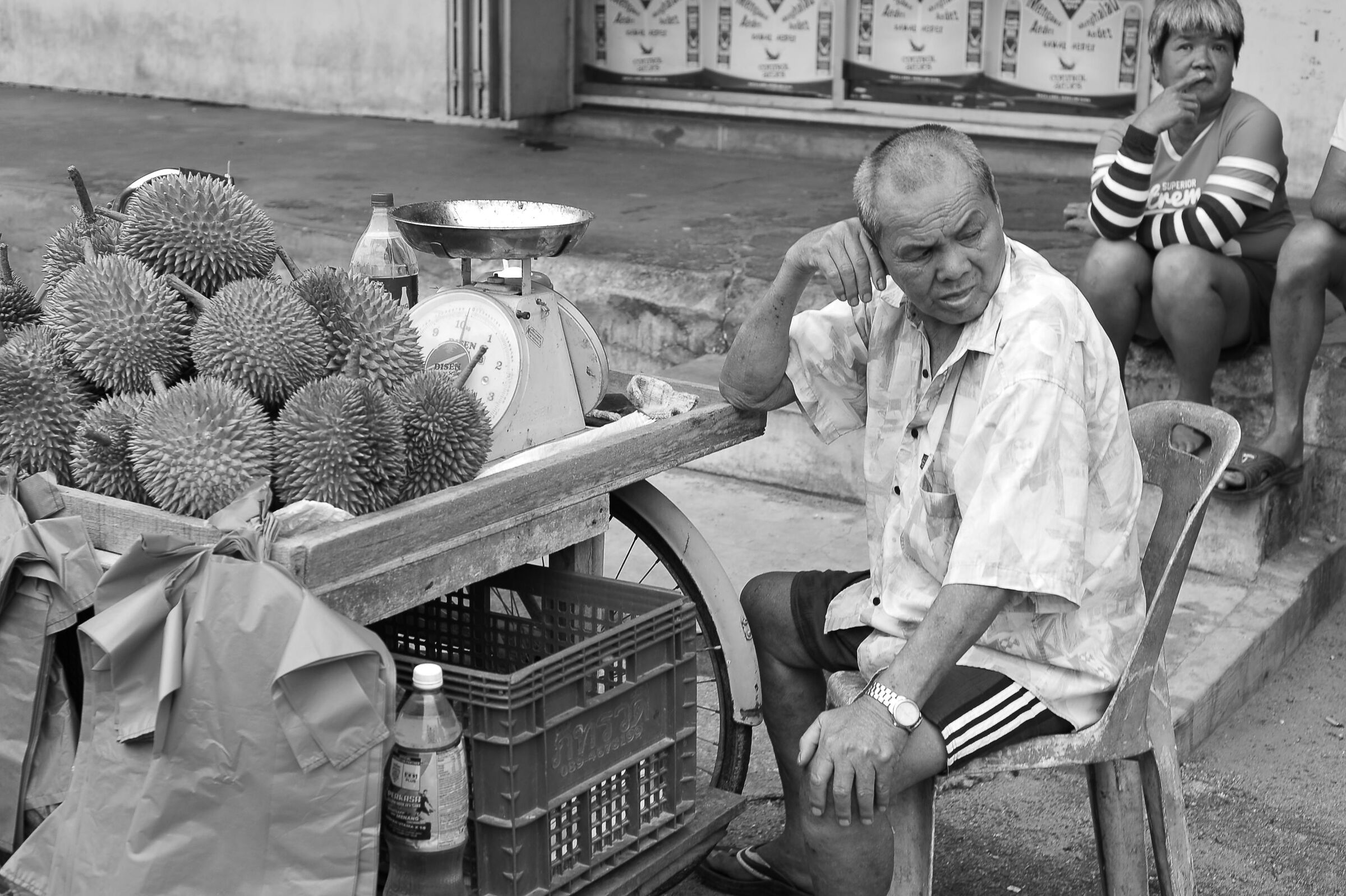 Man selling durians