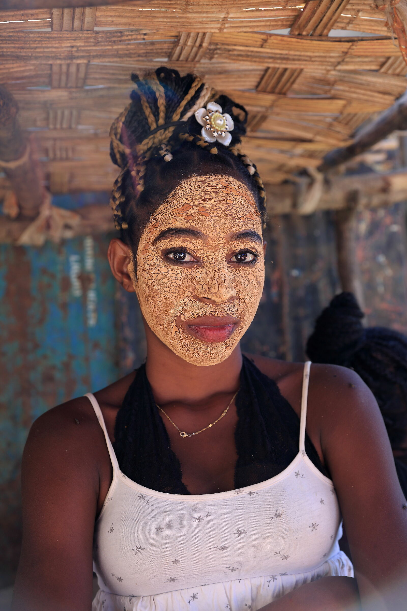Malagasy girl with protective clay mask