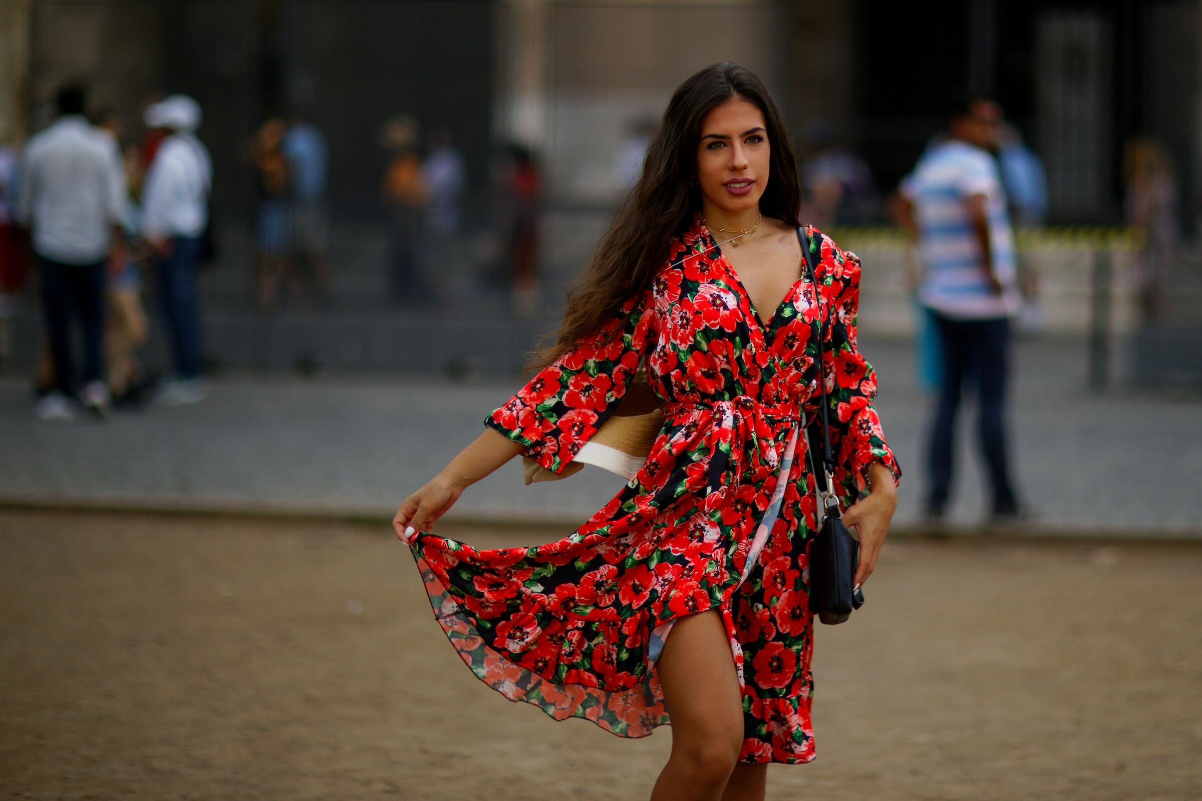 a beautiful dress with red flowers