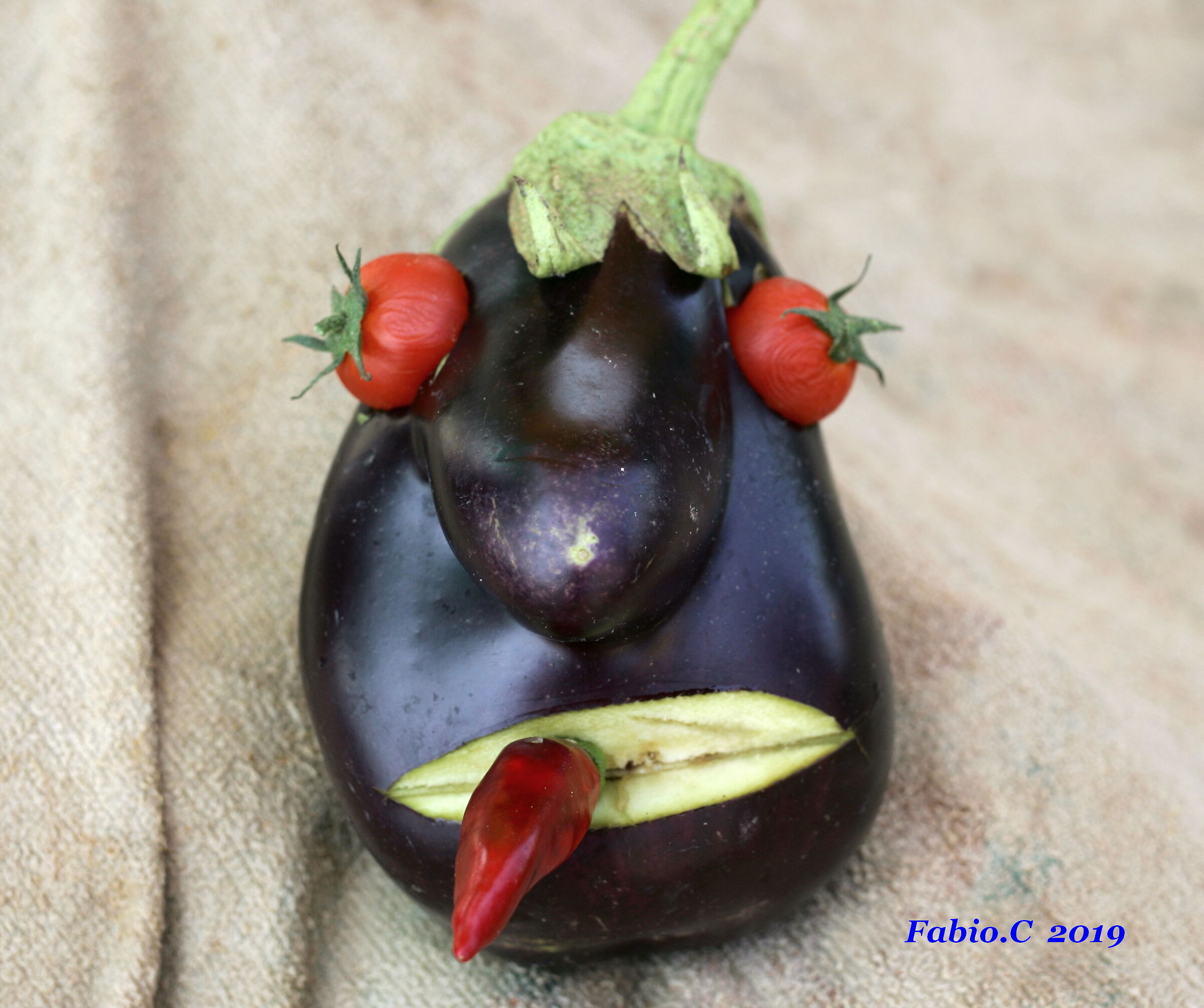 With a ....... Eggplant.....!!!