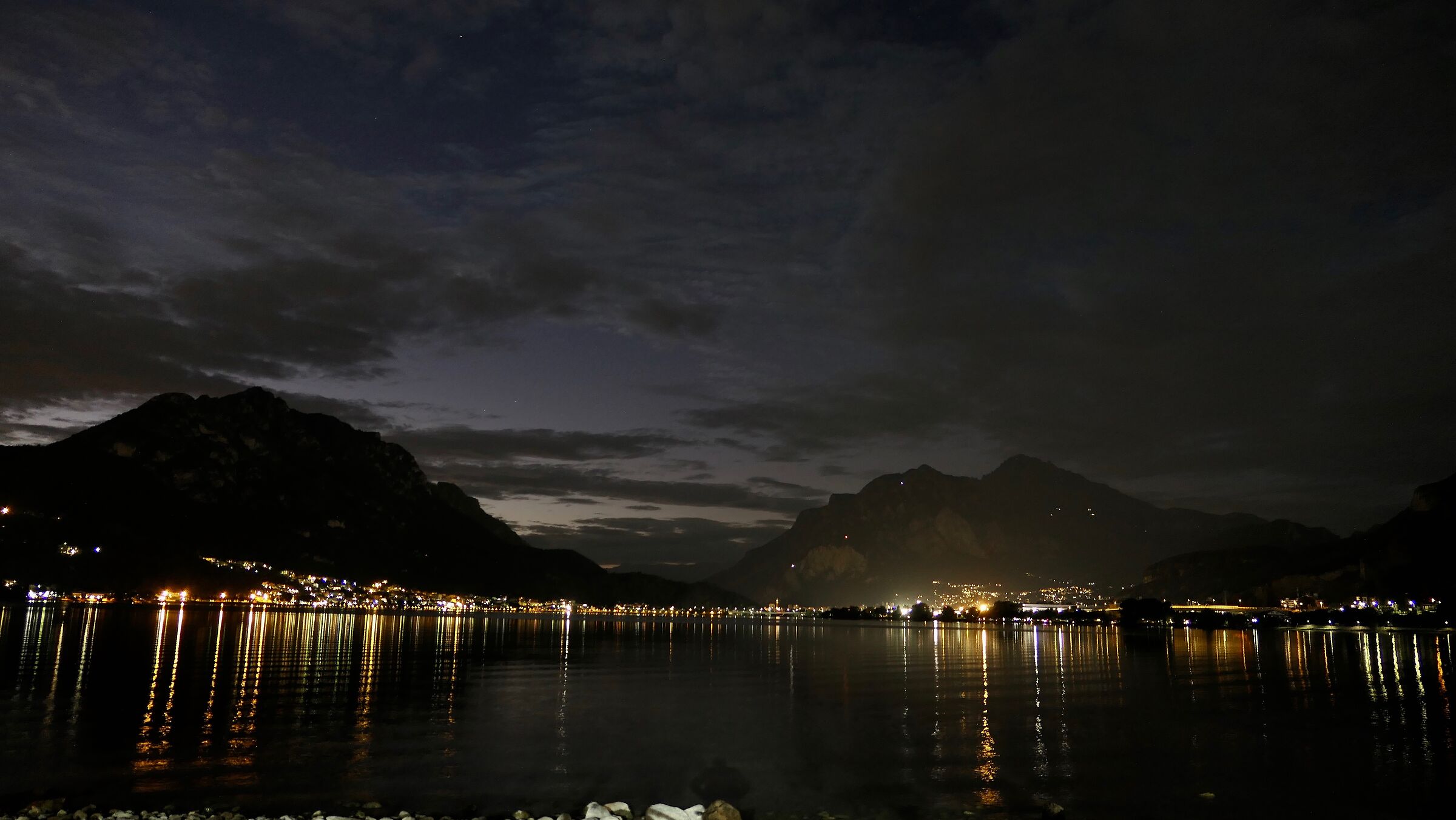 Lecco is reflected at dusk on Lake Garlate 2
