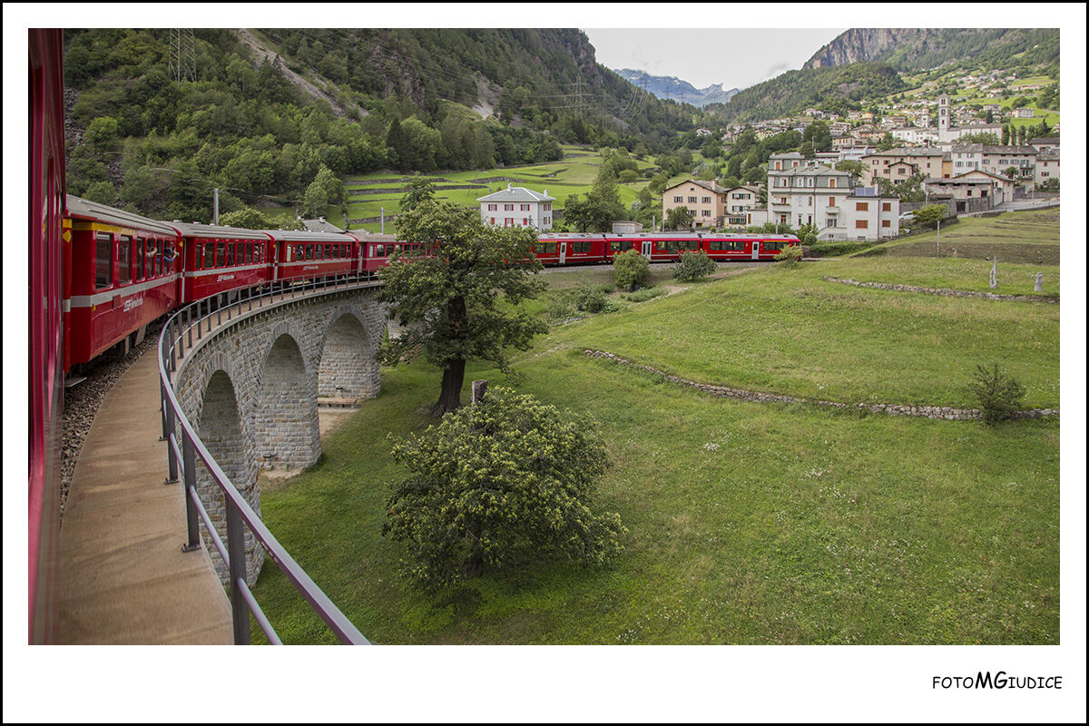 Bernina's red train on the Brusio Viaduct
