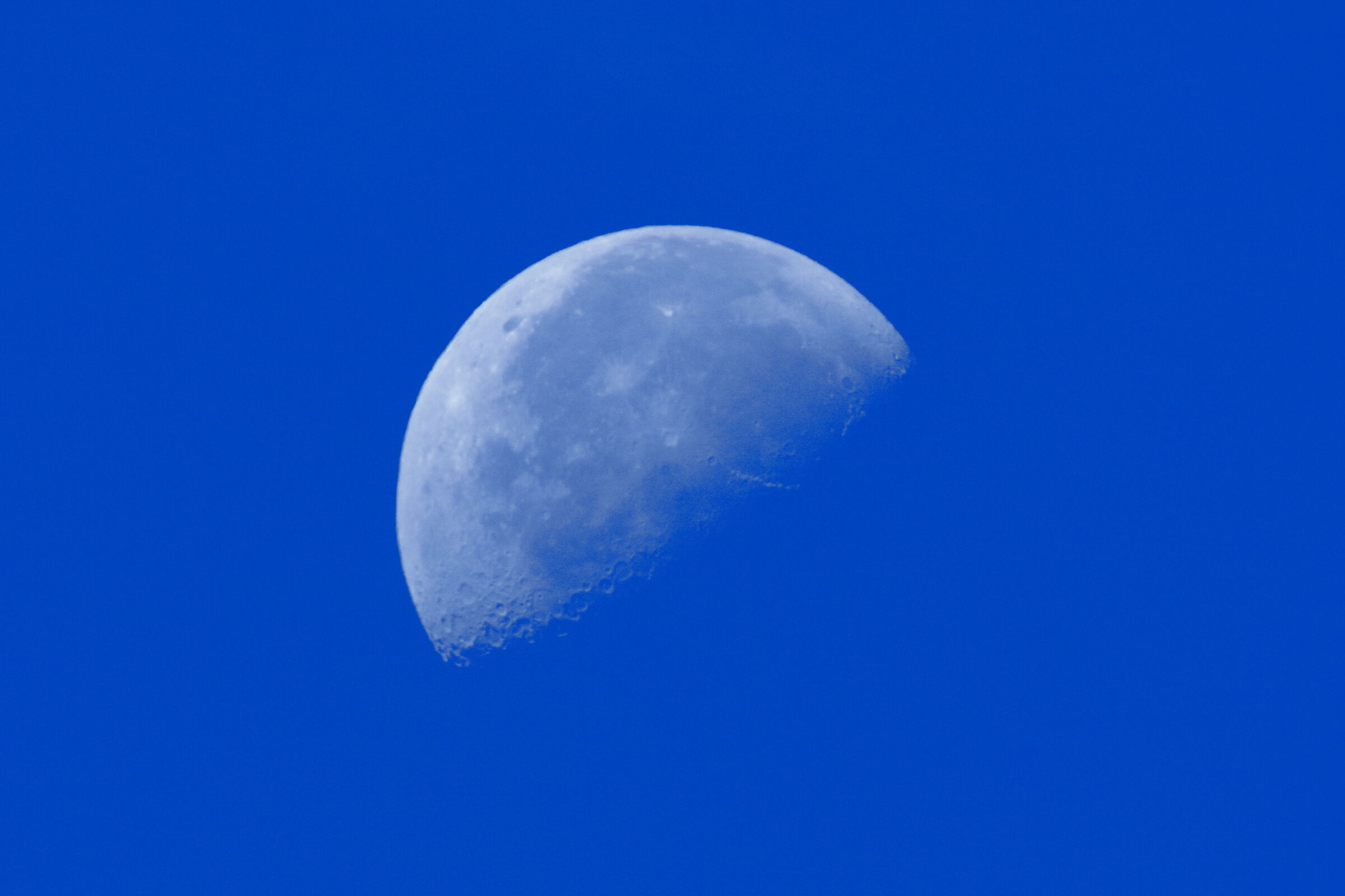 A clearly visible moon in the morning