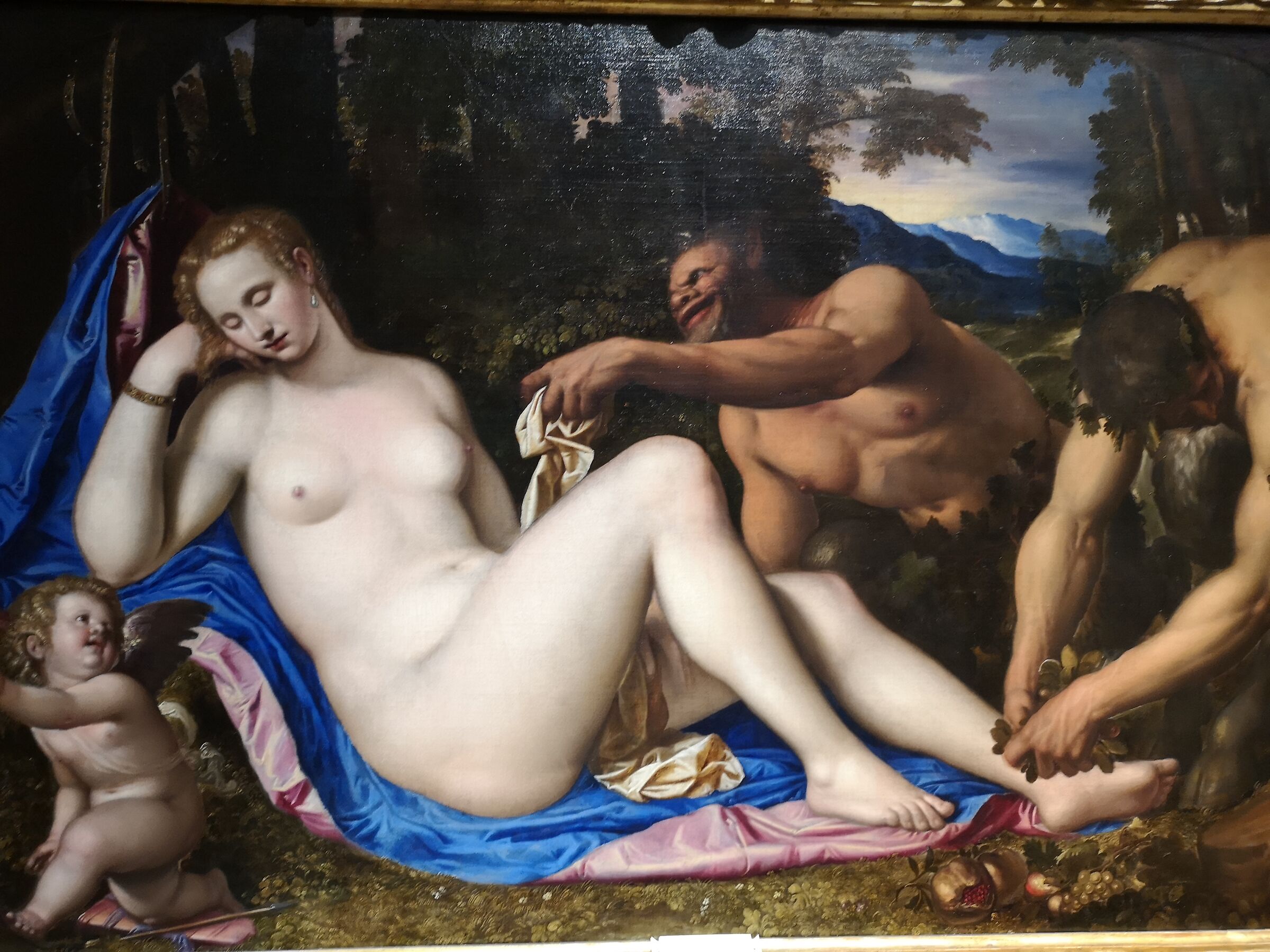 Venus and cupid with two satyrs -