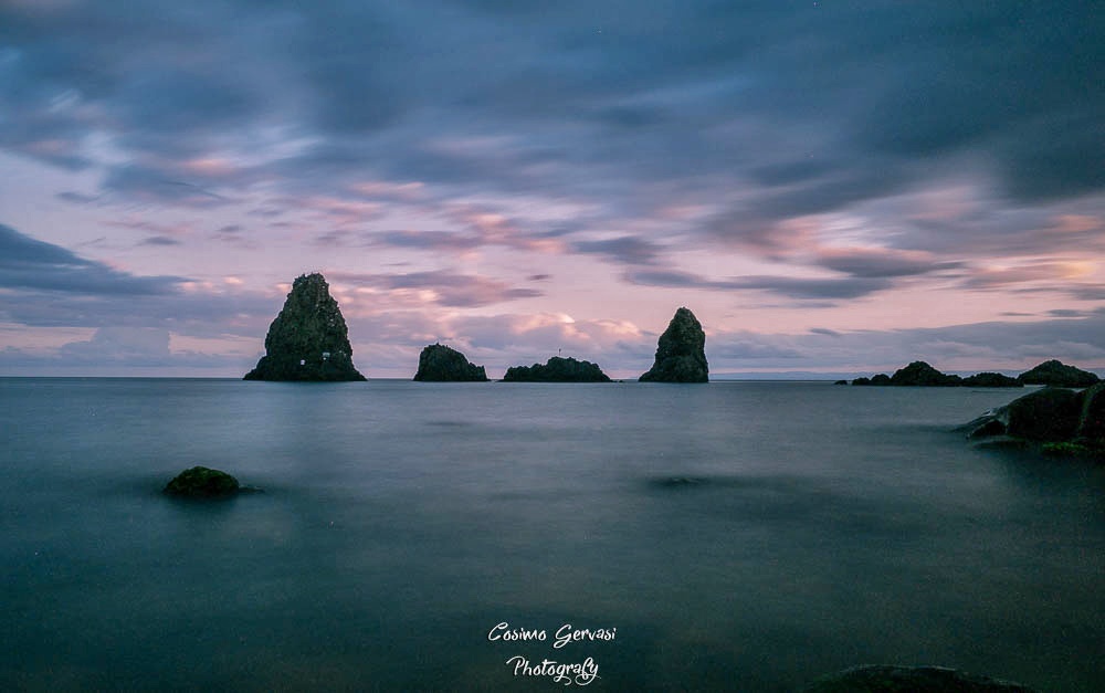 Faraglioni al tramonto