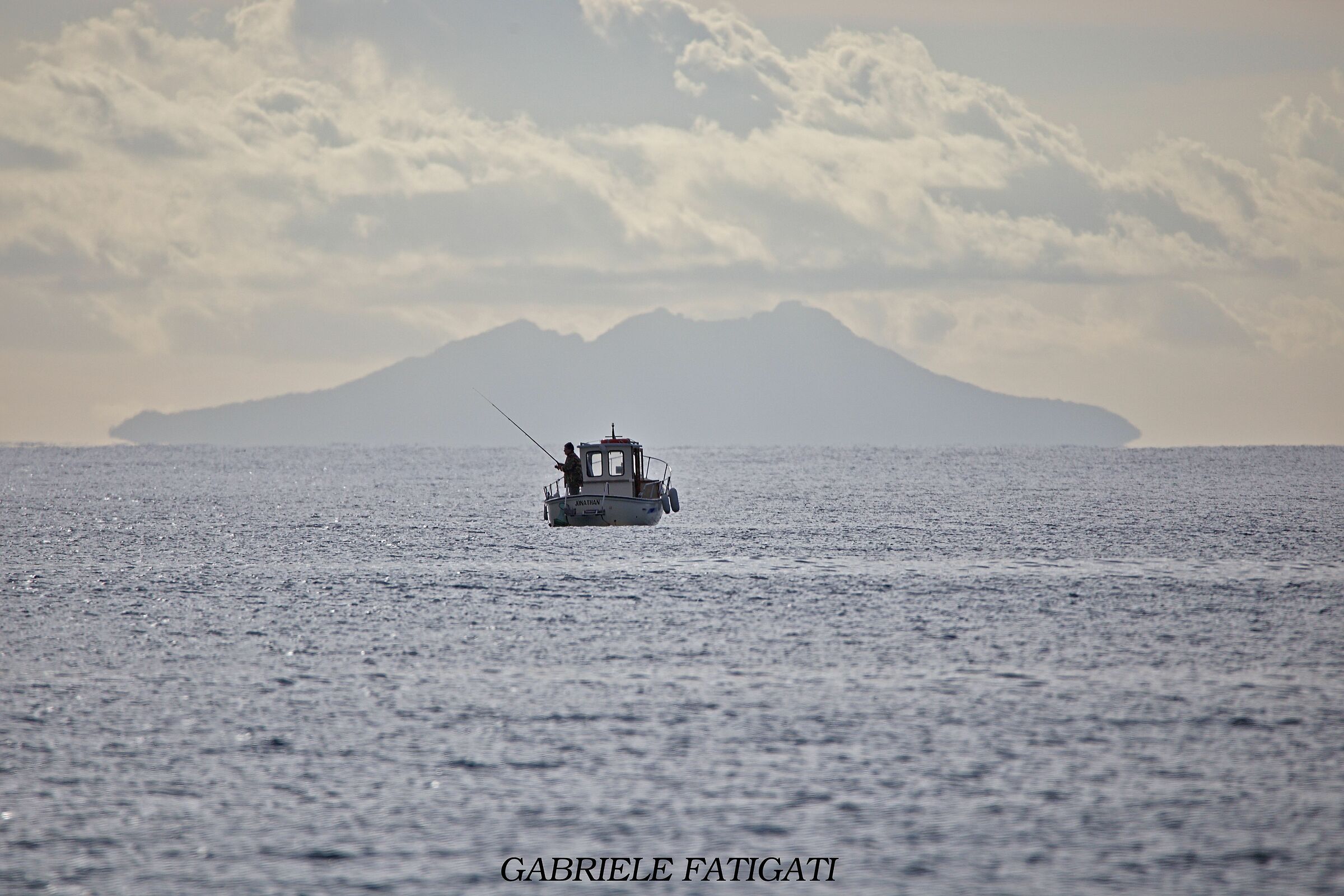 Il pescatore e l'isola di Montecristo