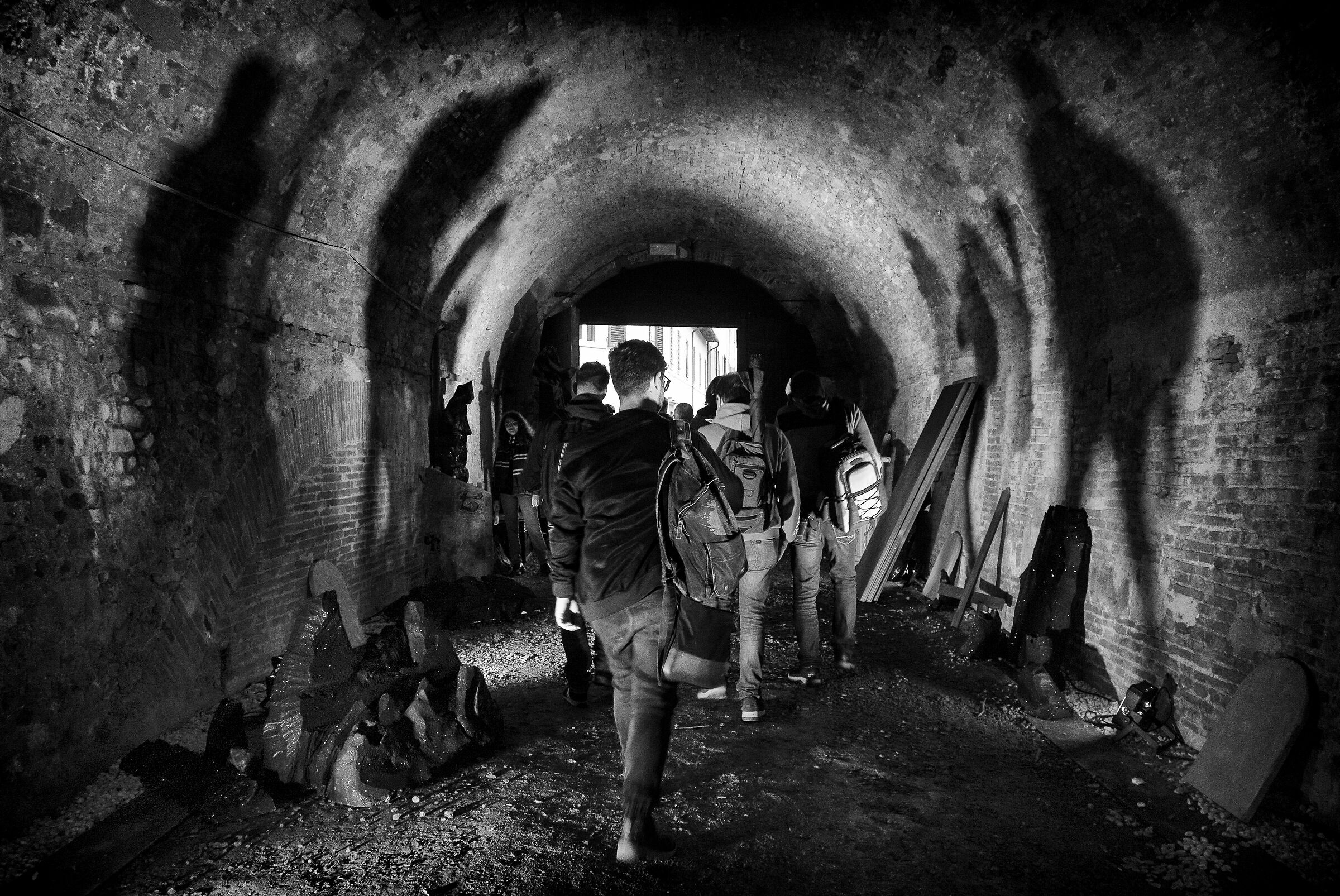 In the shadow of the grim companion who walks with us