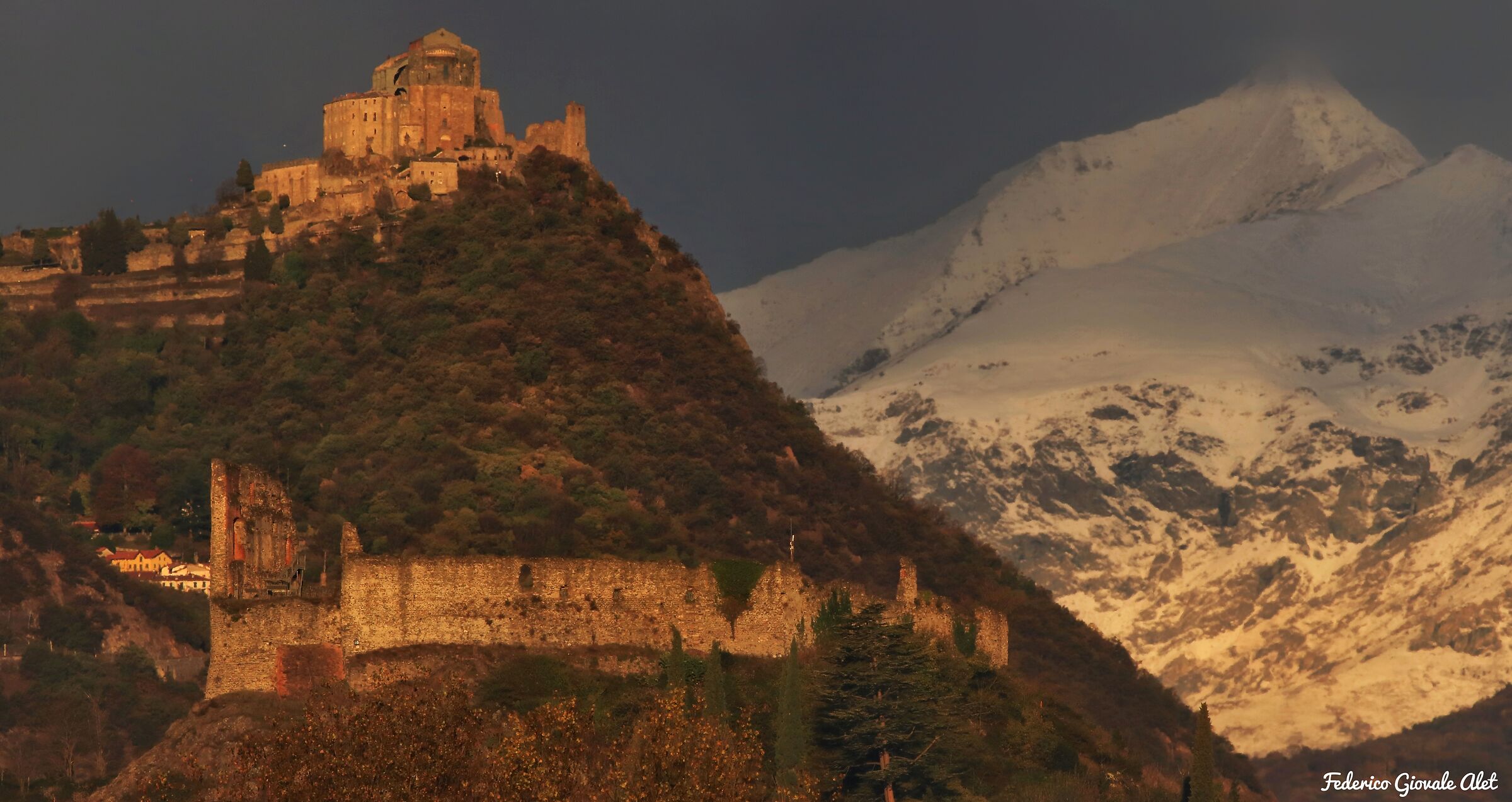 The three lookouts of the Susa Valley with blizzard on the