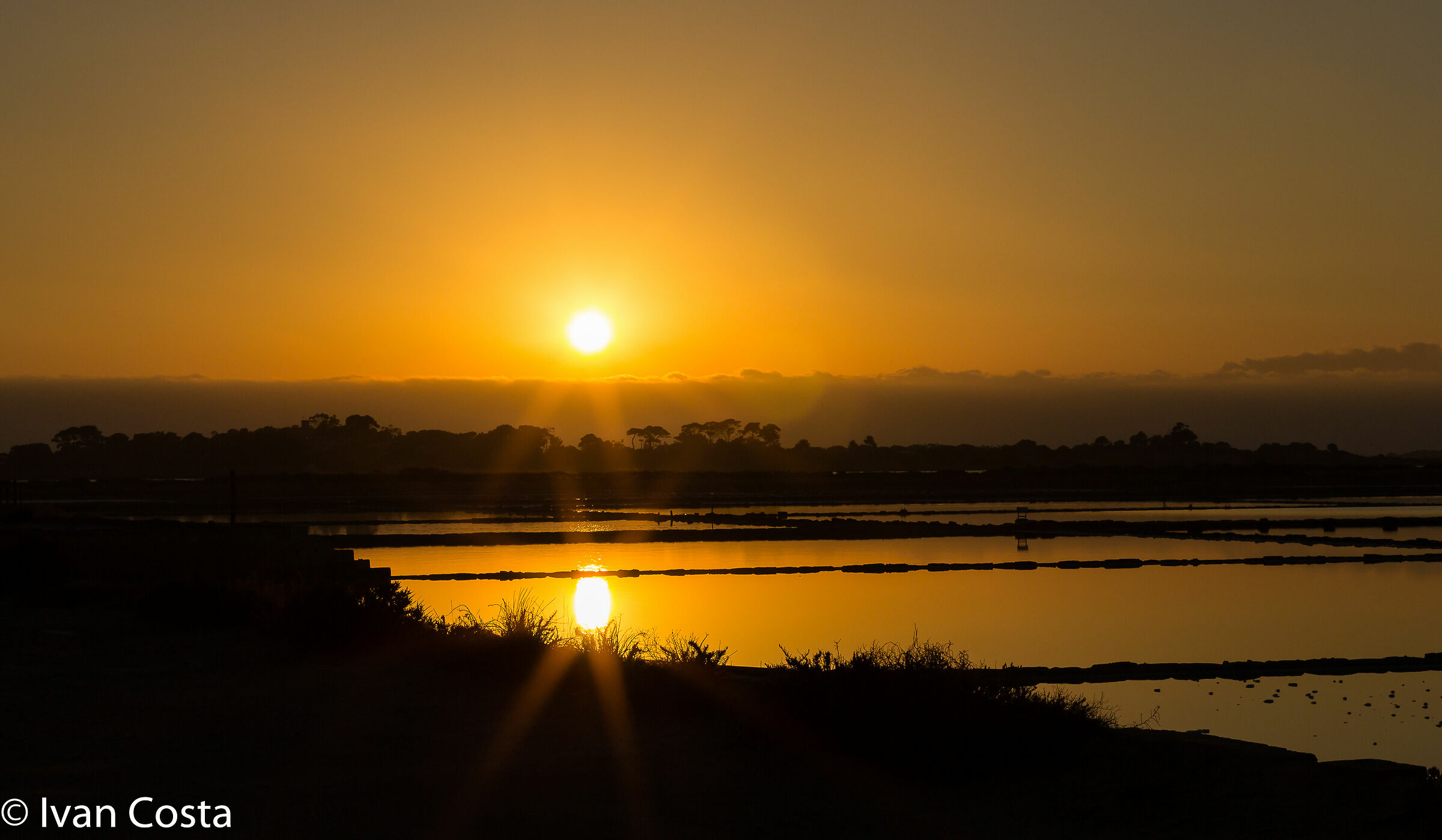 Tramonto estivo allo Stagnone di Marsala