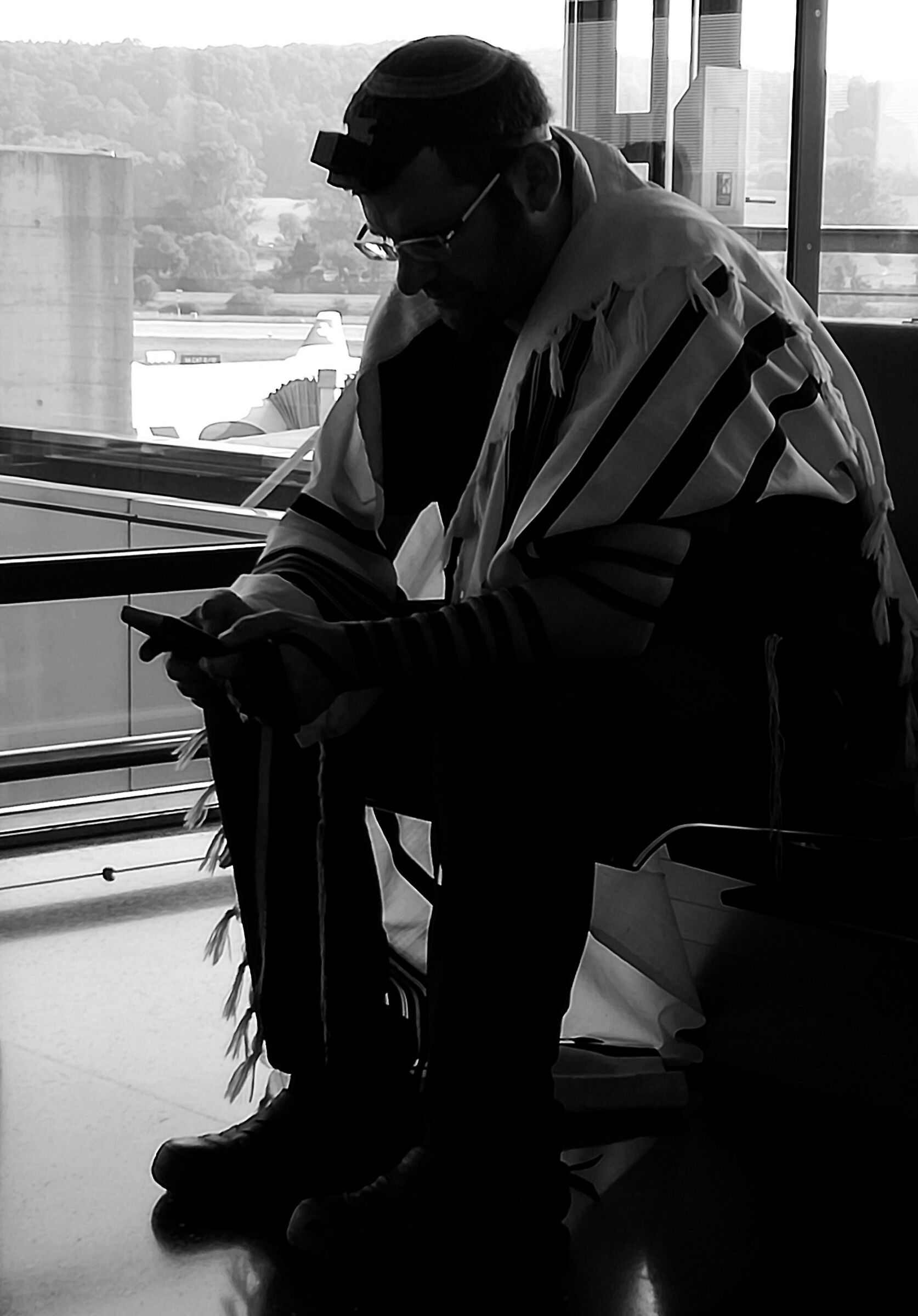 Prayer waiting for the flight to Tel Aviv