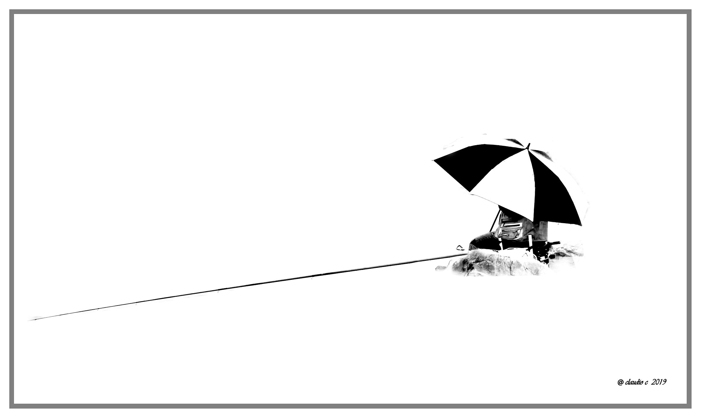 the fisherman with umbrella