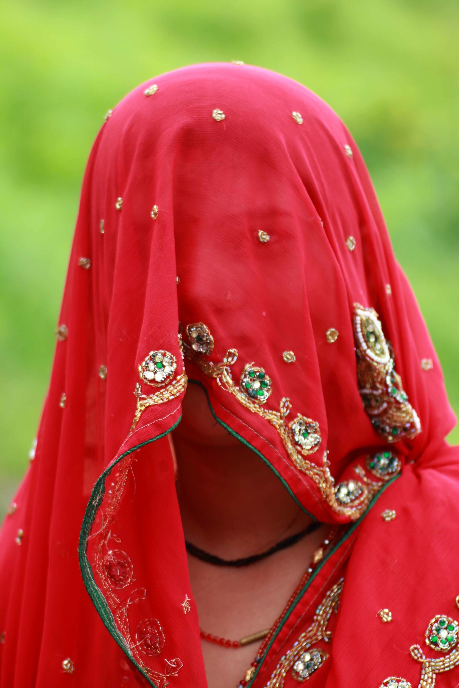 WOMAN IN RED - INDIA