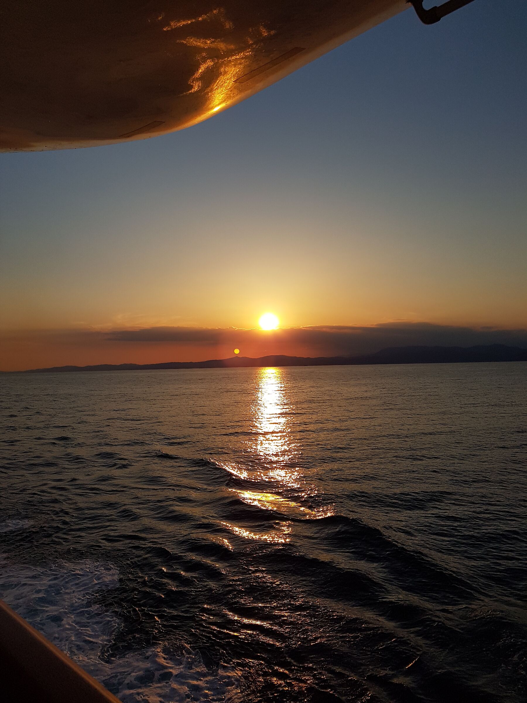 The sun sets, the moon comes out