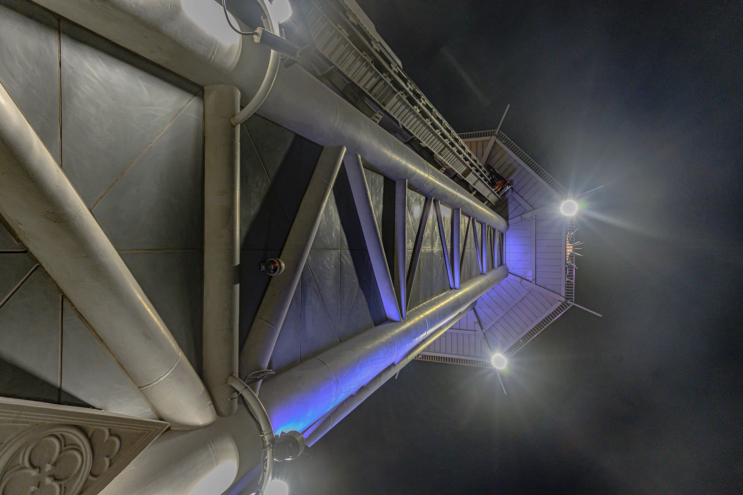 at the top of the tower looking at the needle of the "syring...