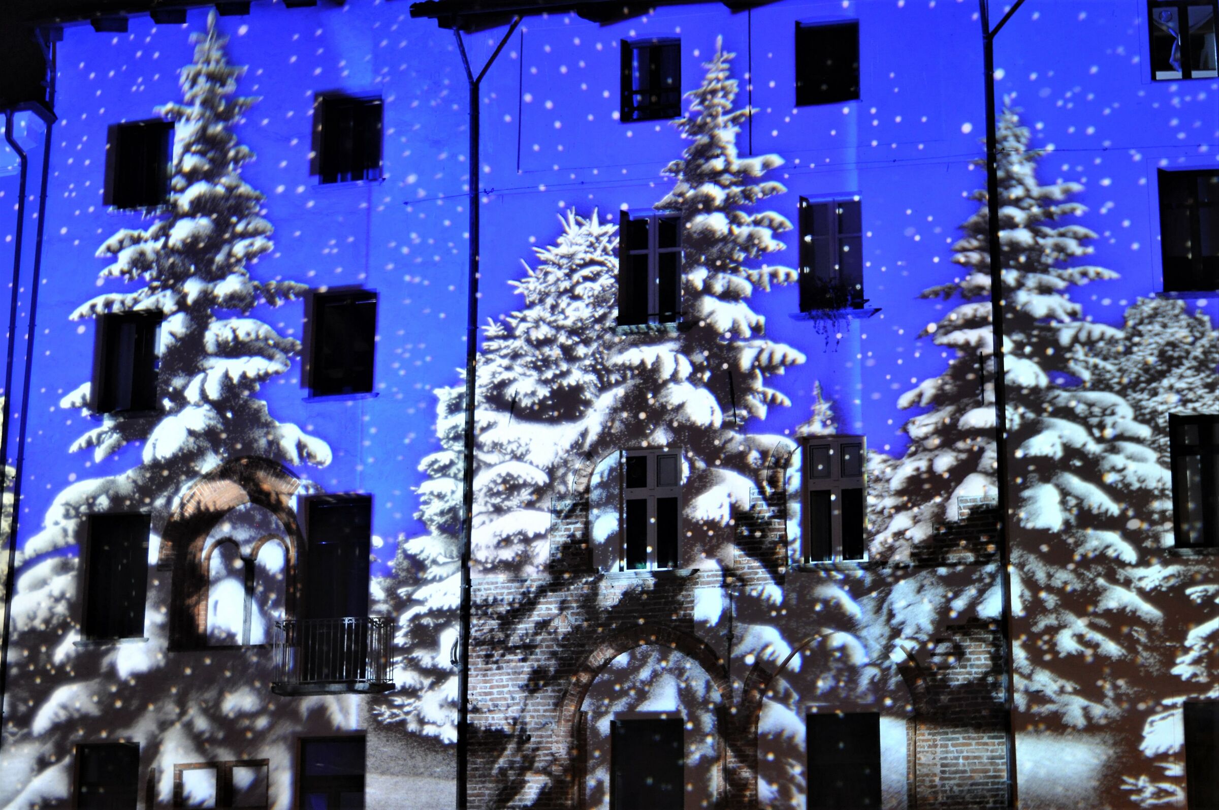 Pinerolo by night lights in St. Donato Square
