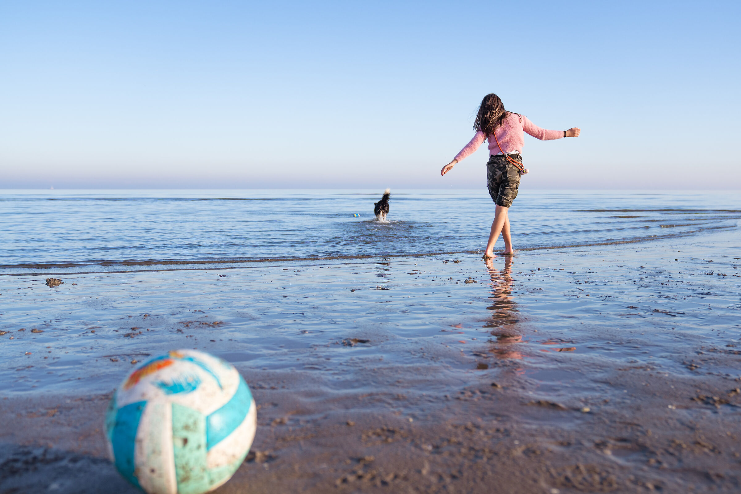 Playing in winter at the seaside