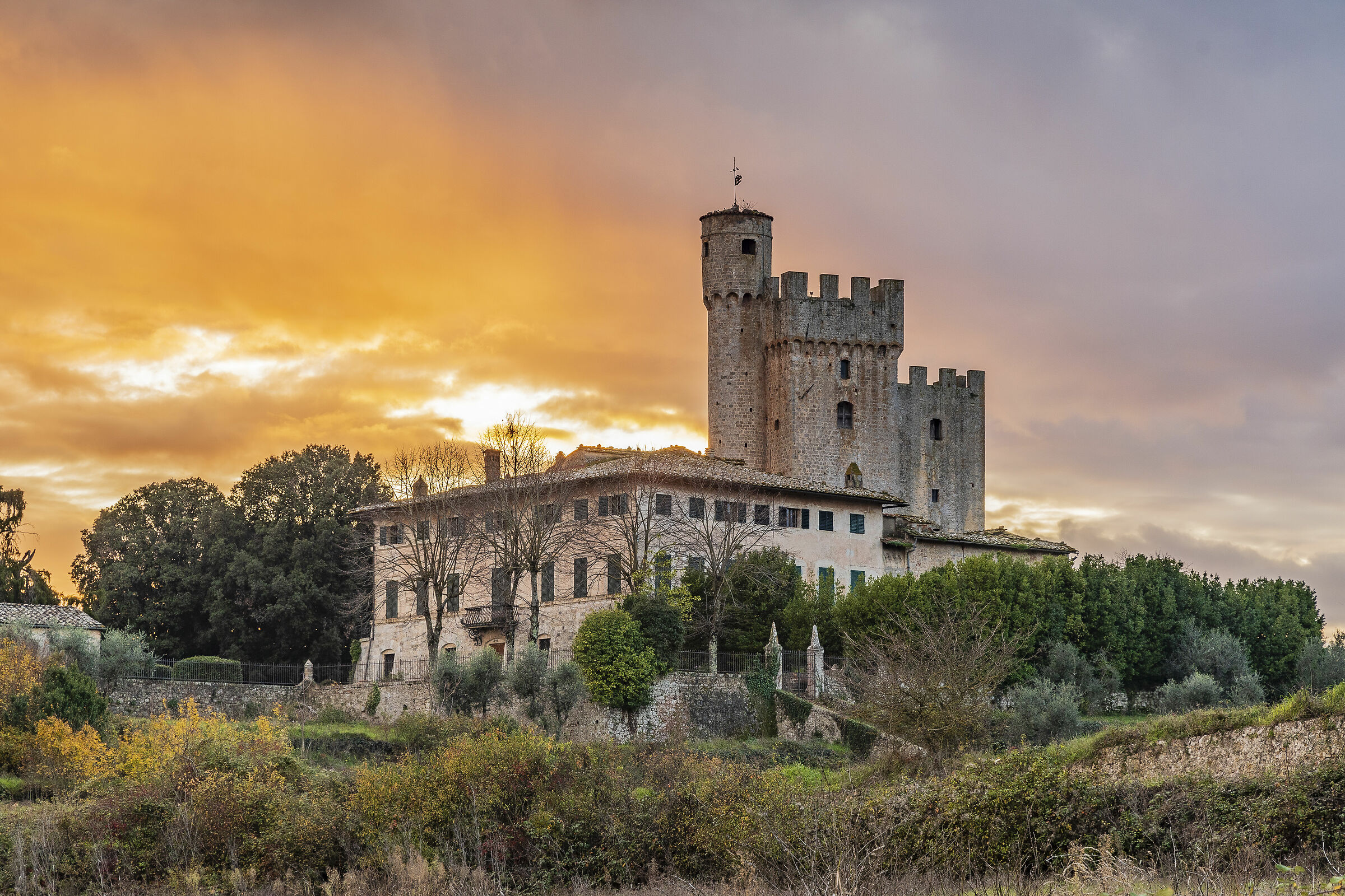 Fire in the sky in senese countryside