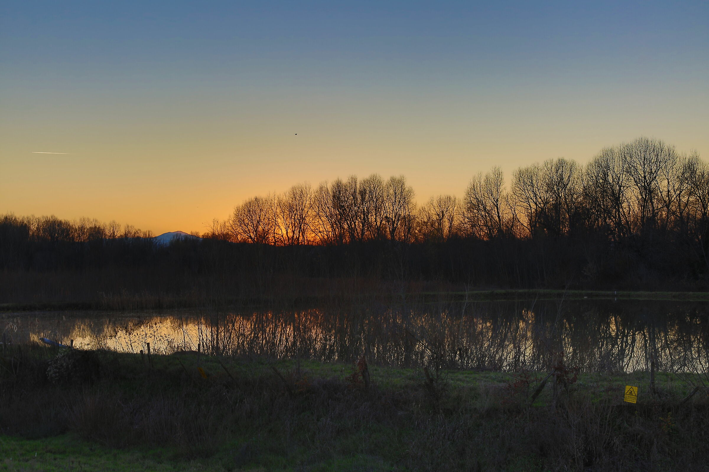 sunset over the quarry lake