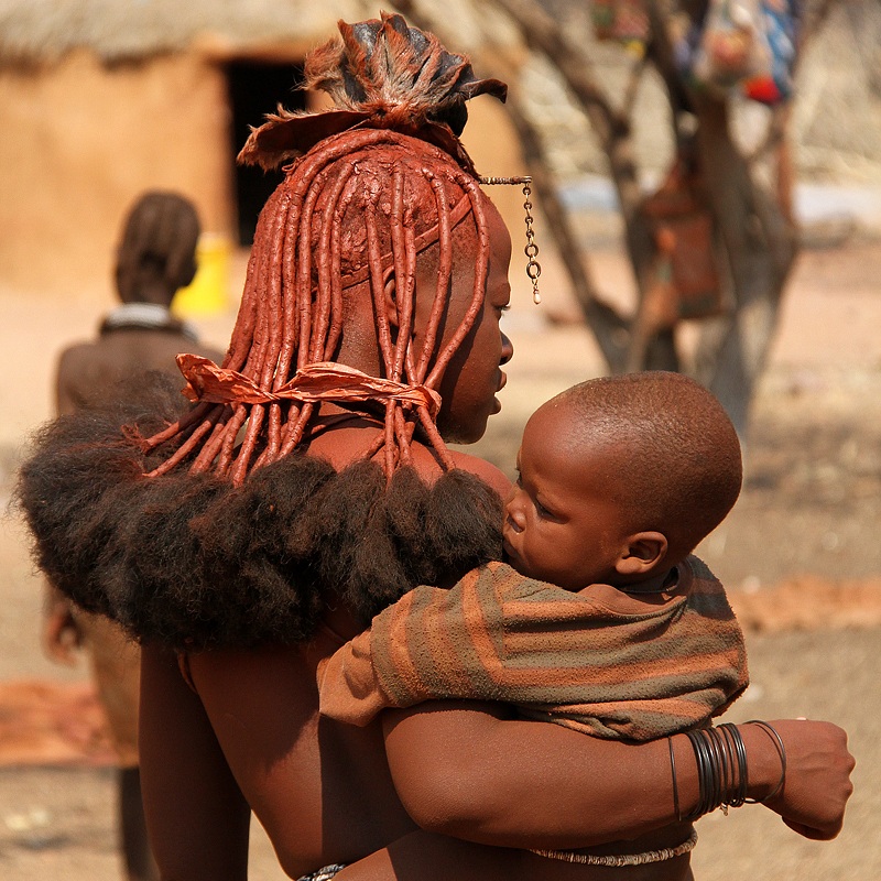 Young Himba with child