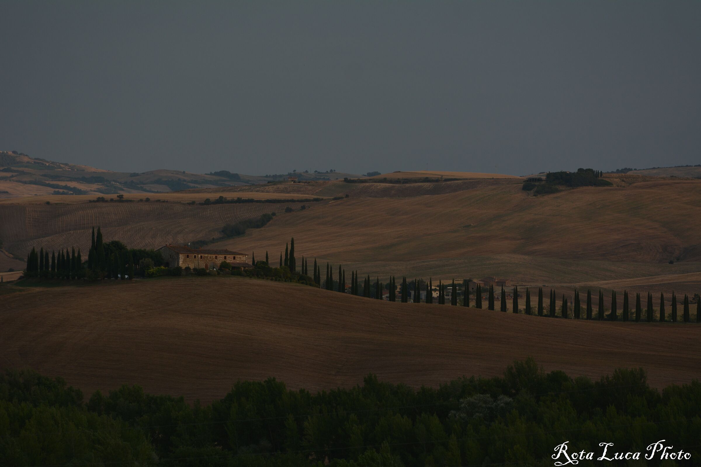 Colline della Val d'Orcia al tramonto