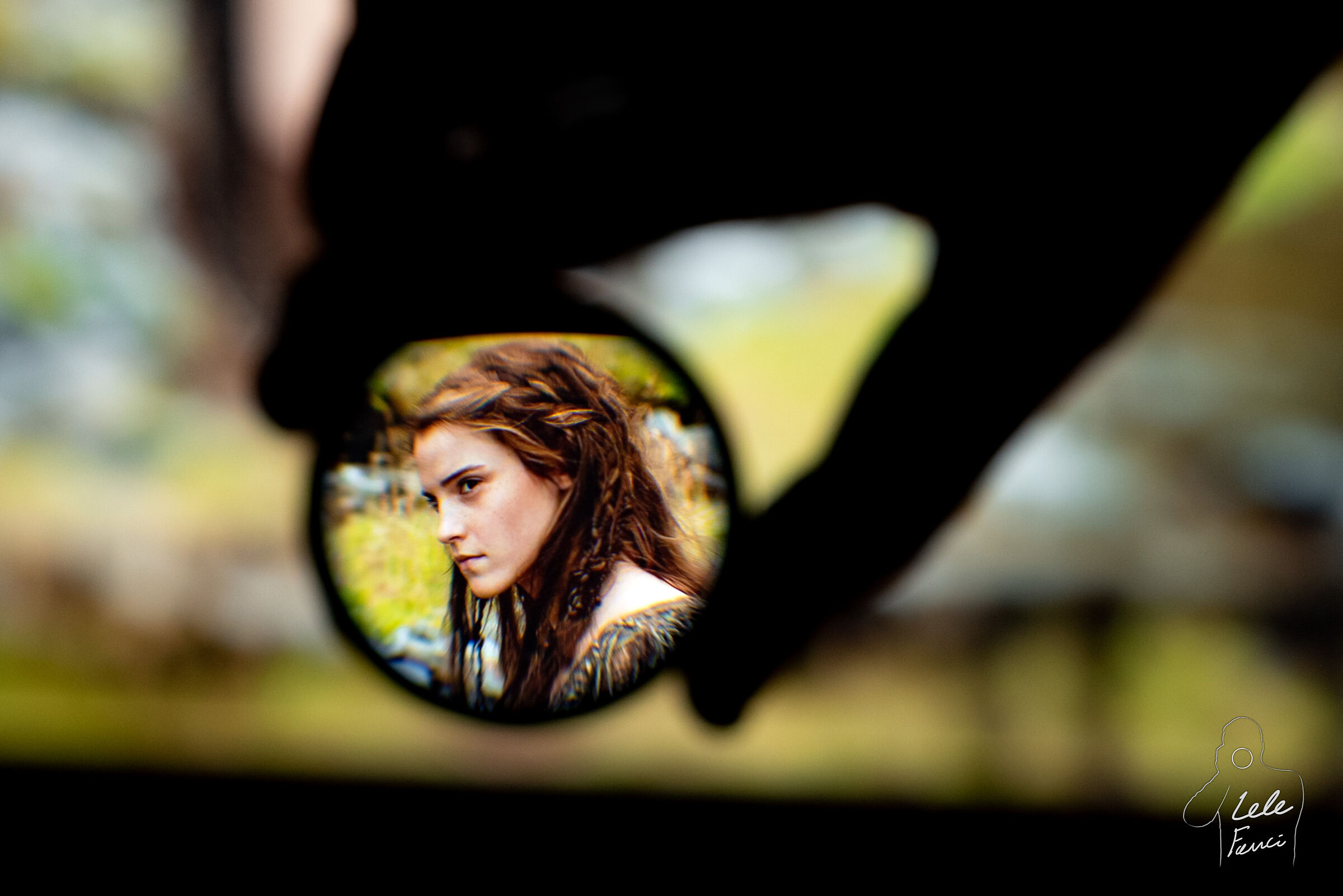 Look at me through a lens.