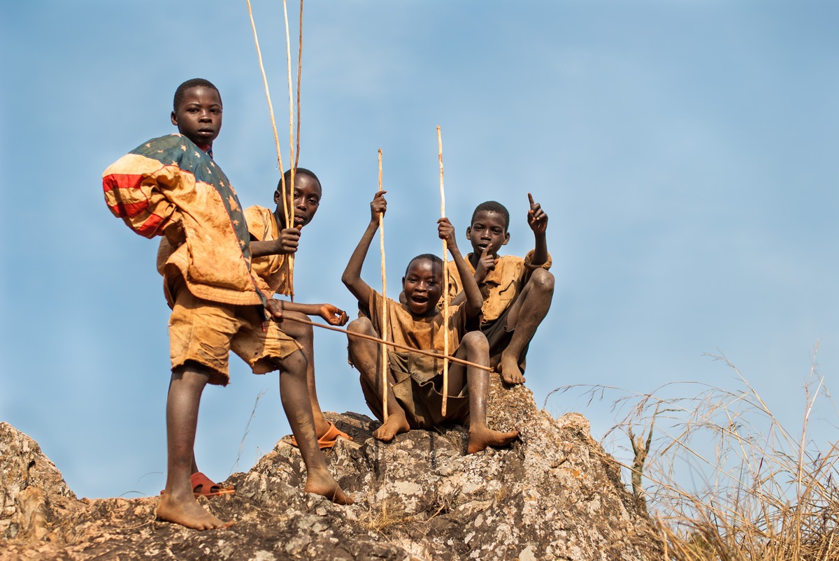 Children fishing in the river
