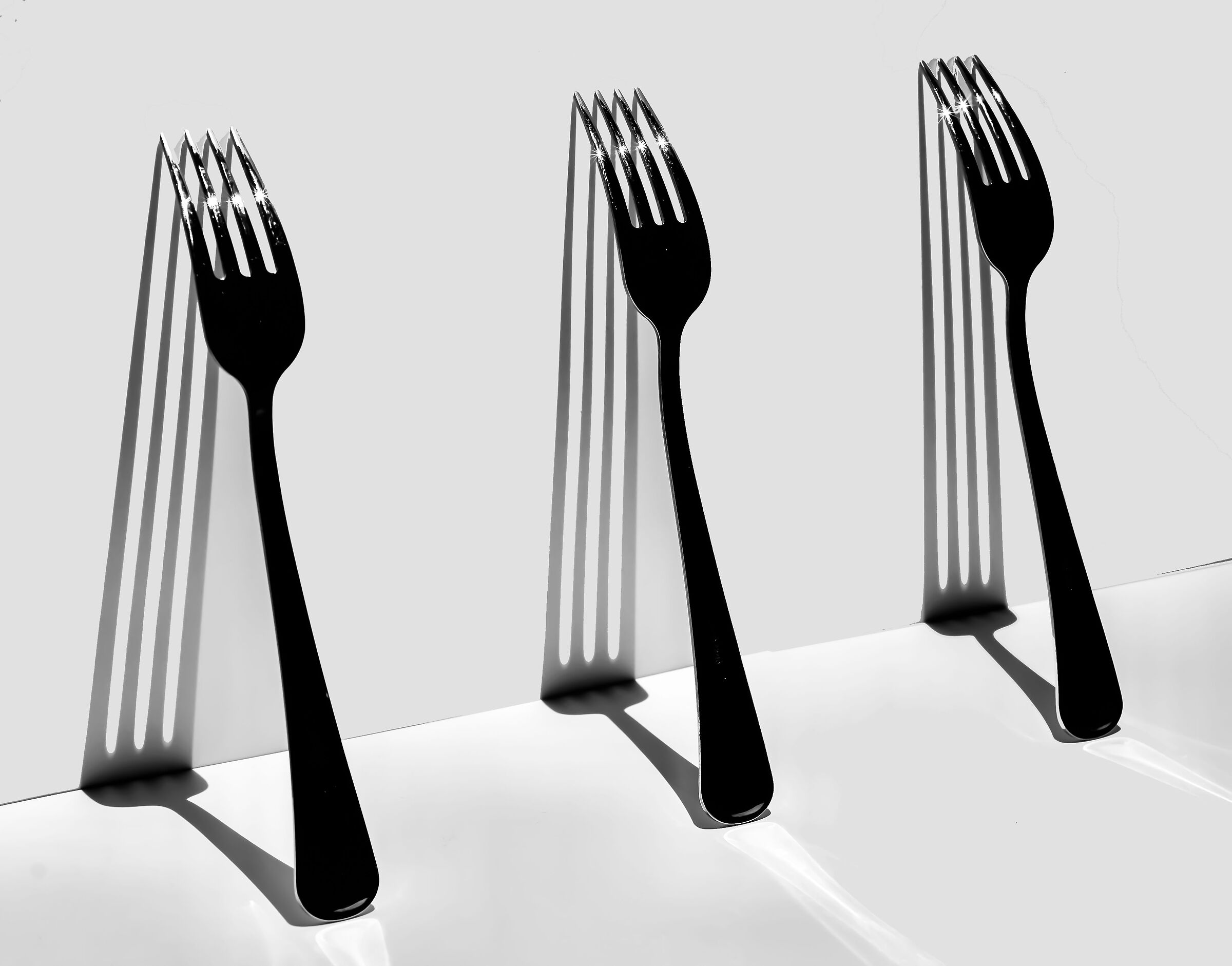 Forchette con la loro ombra