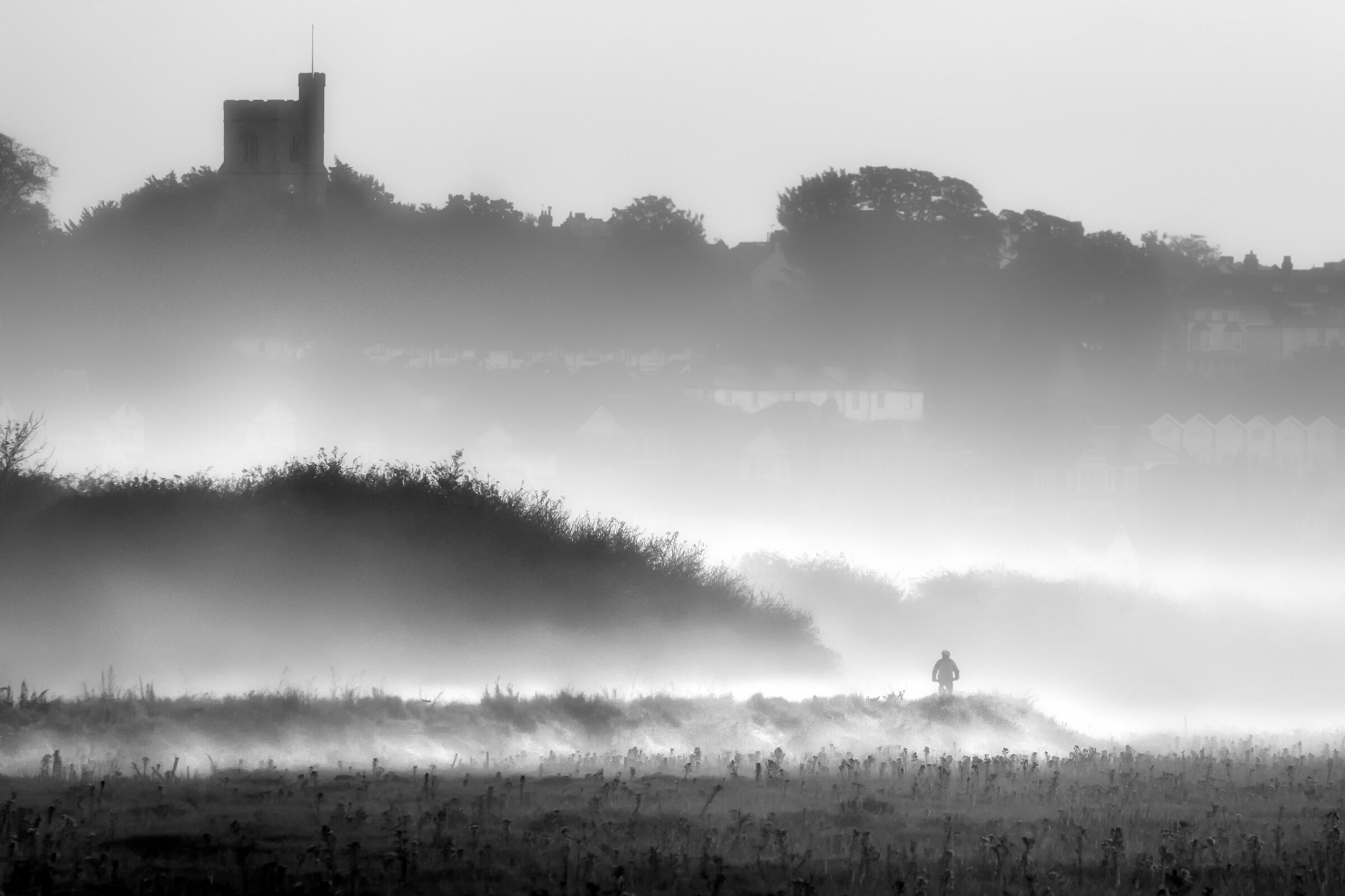 Ciclista nella nebbia