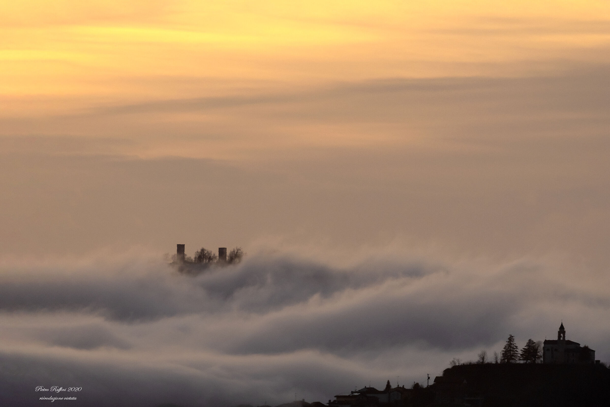 Misty sunset on the hills