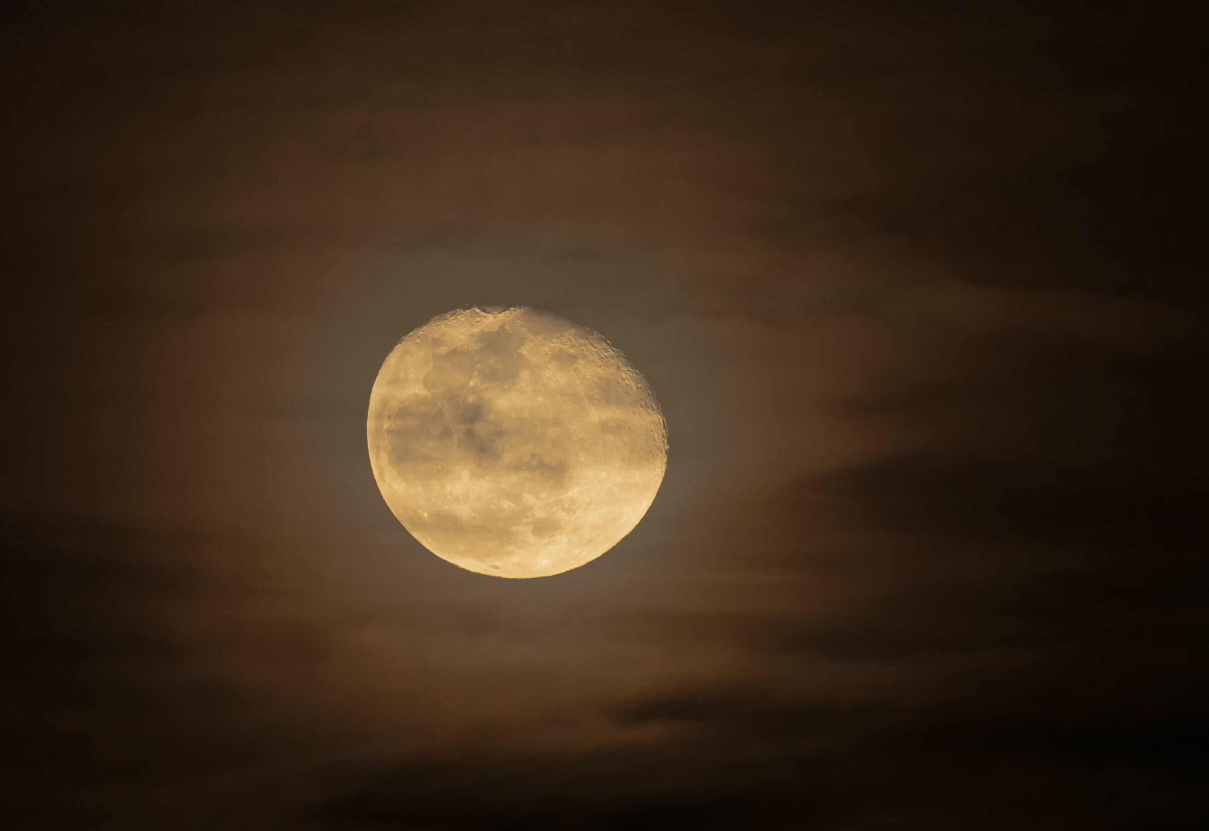 Between clouds and haze the Moon today appeared to me so...