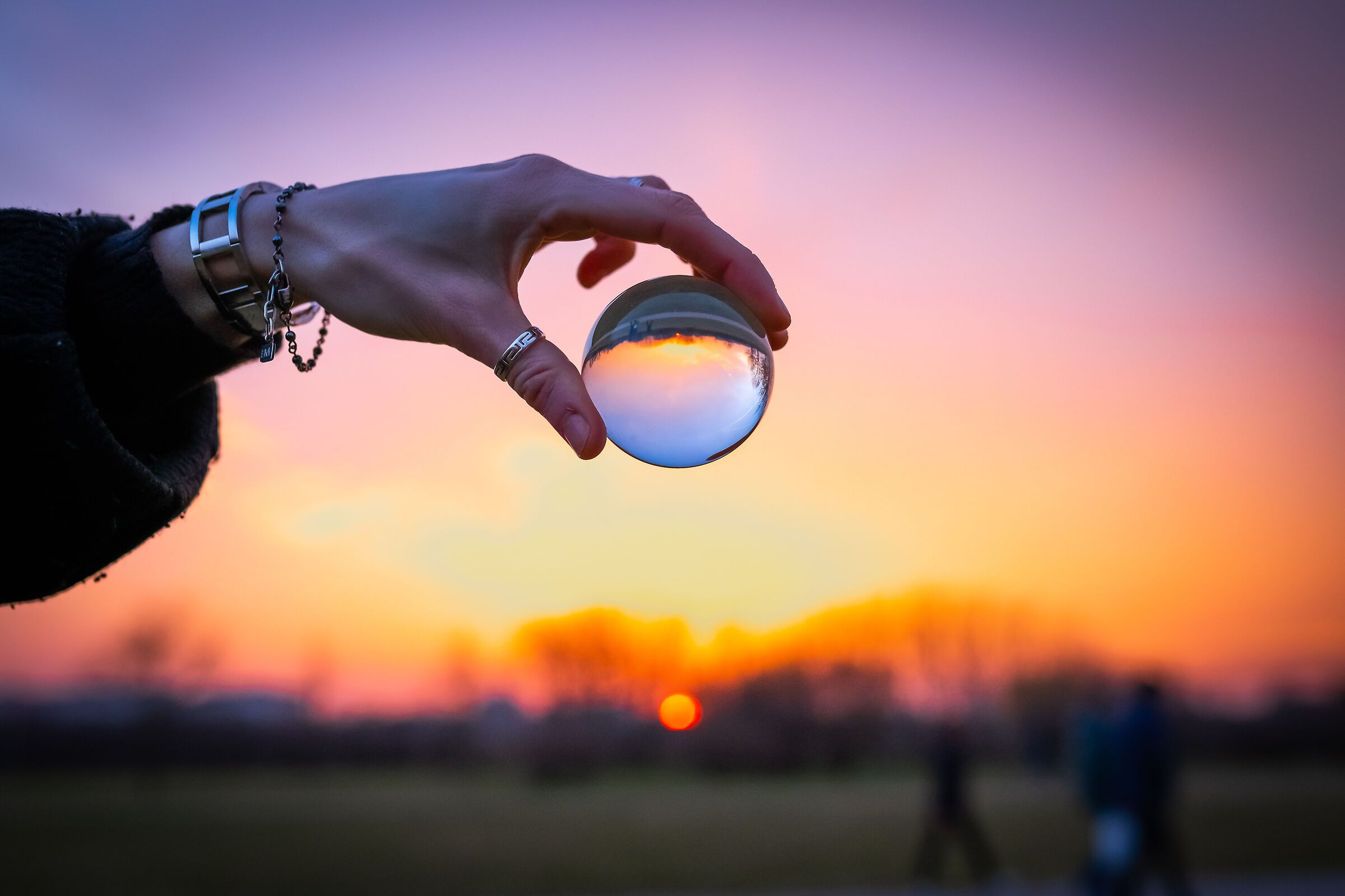 Inflation of the sphere and sunset profit