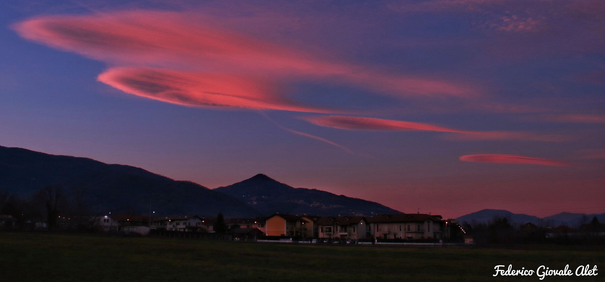 Lenticular sunset over sangone Valley