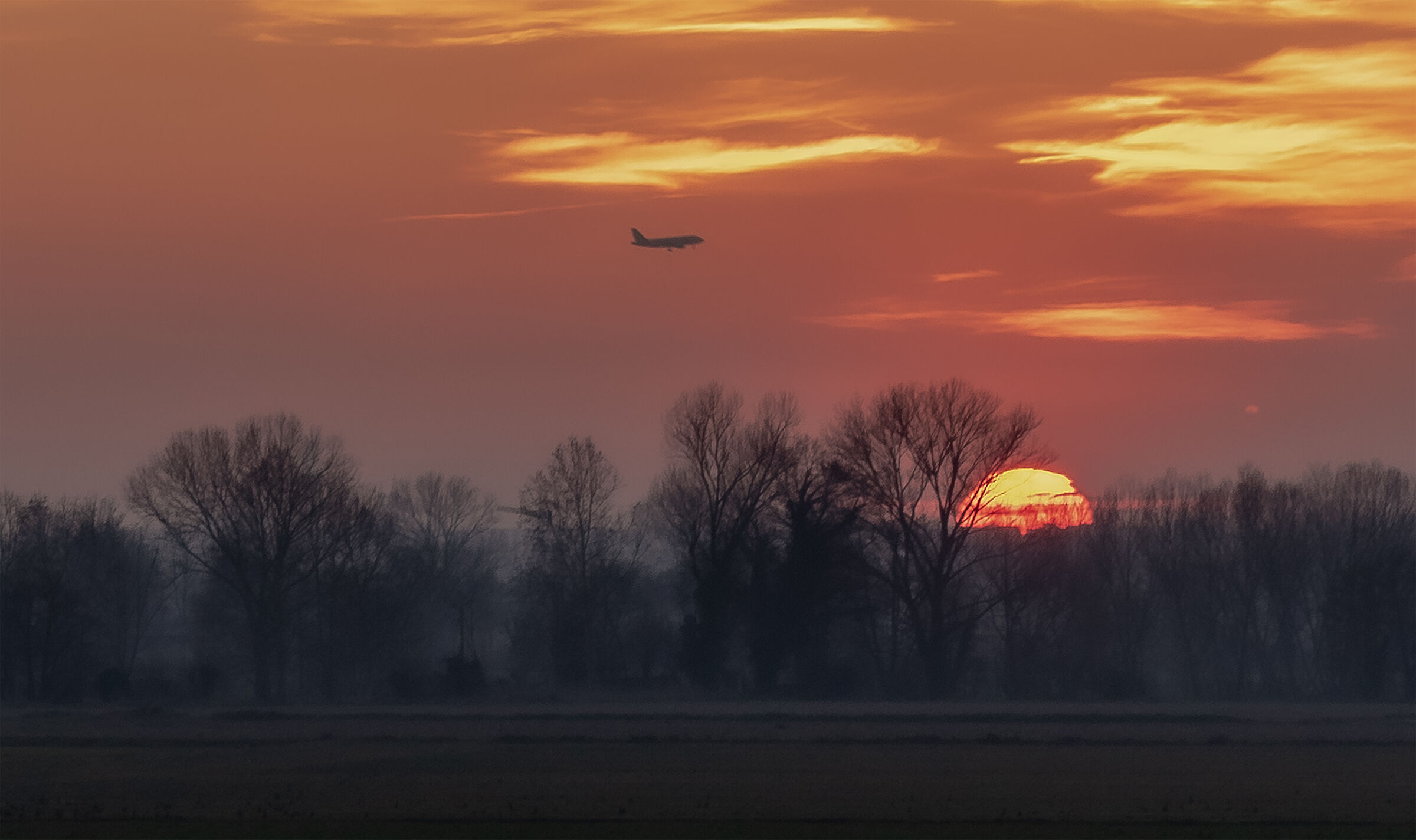 Plane at sunset