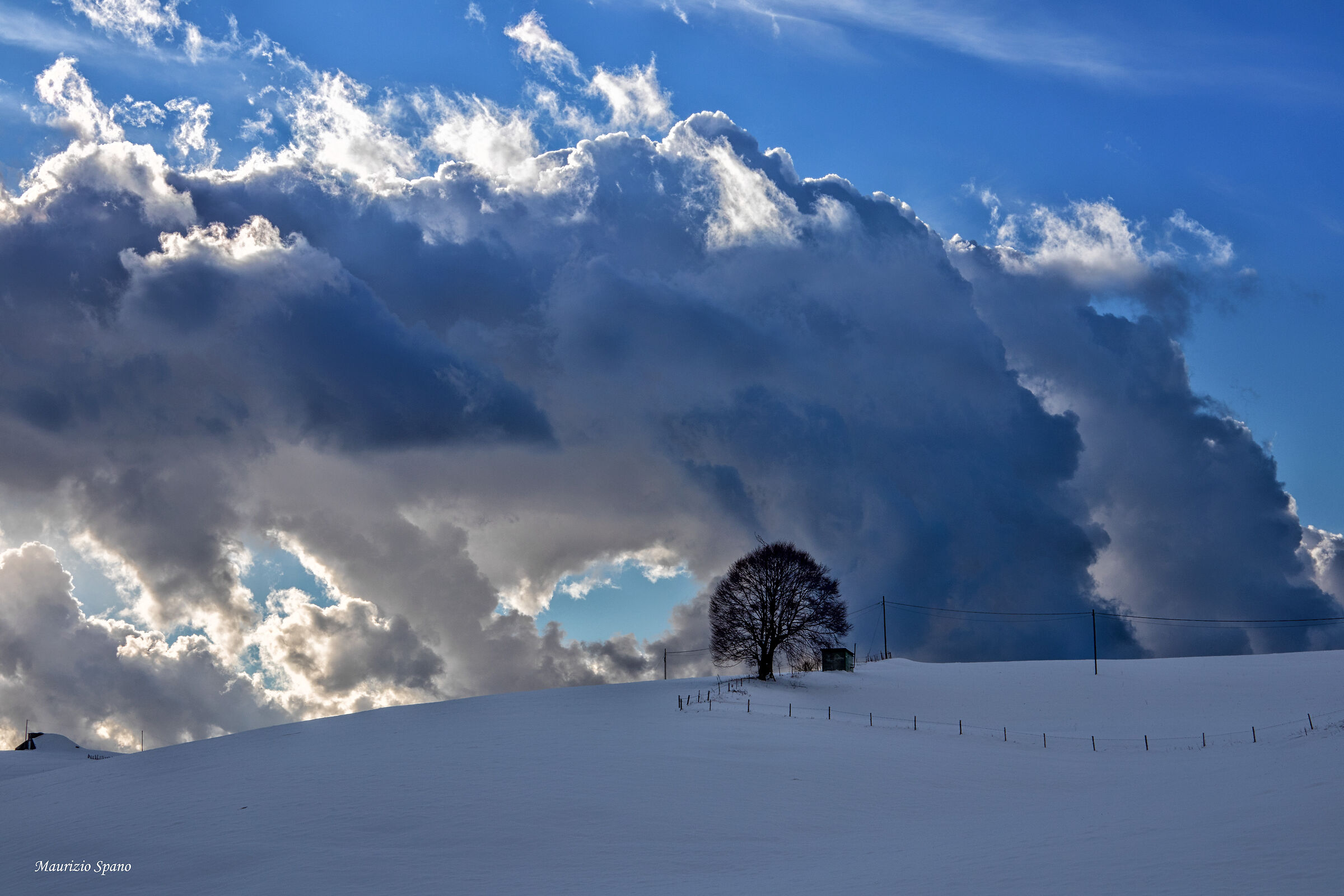 Clouds between sky and snow