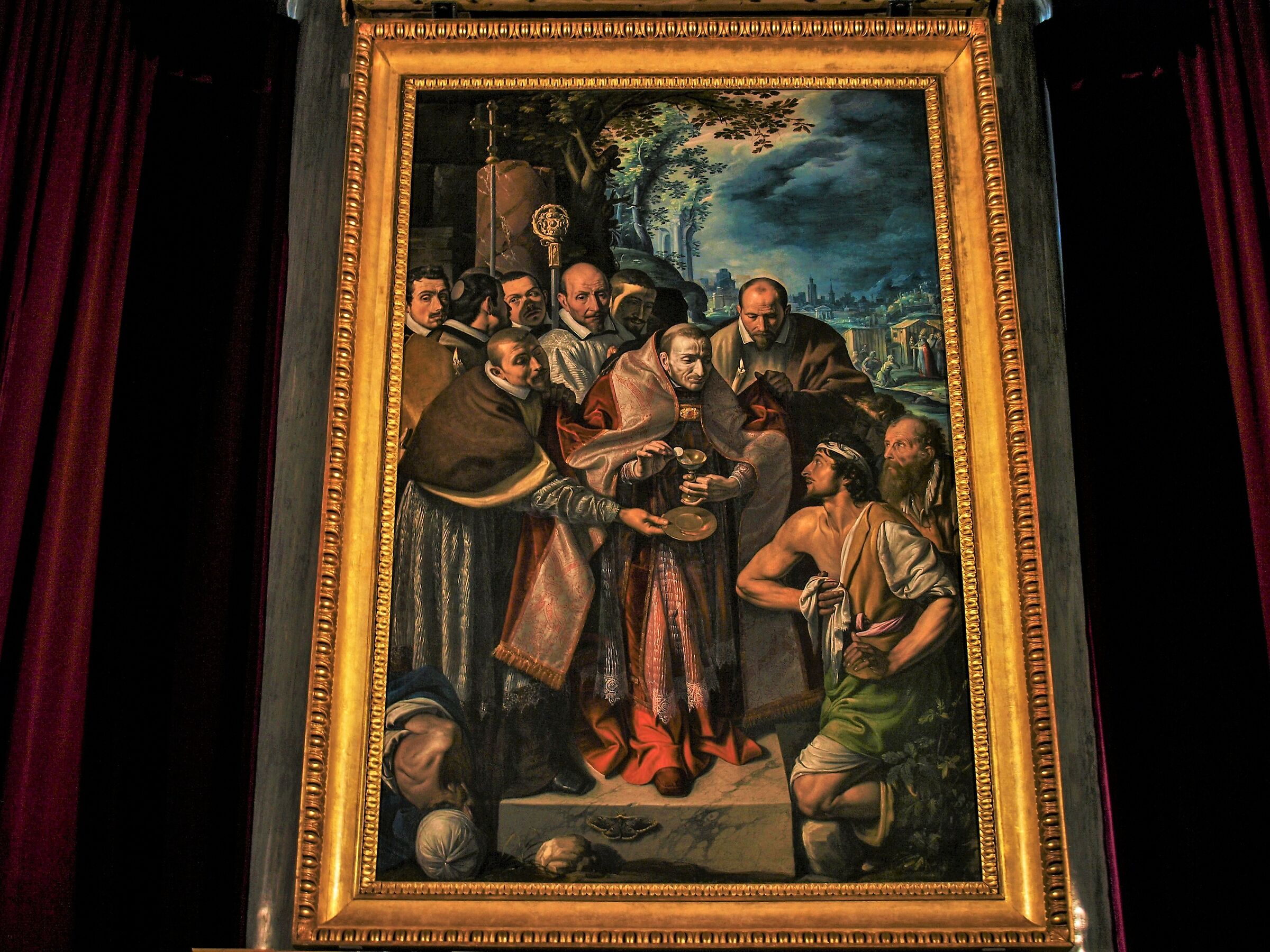San Carlo Borromeo che comunica i malati di peste.