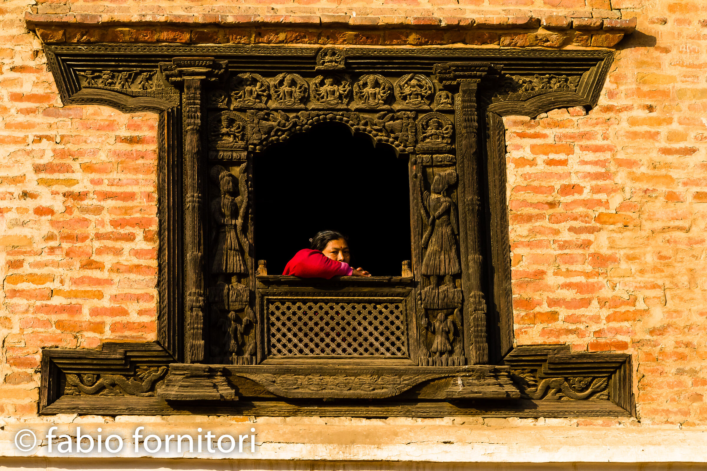 Bhaktapur, Woman in the window, Nepal 2011