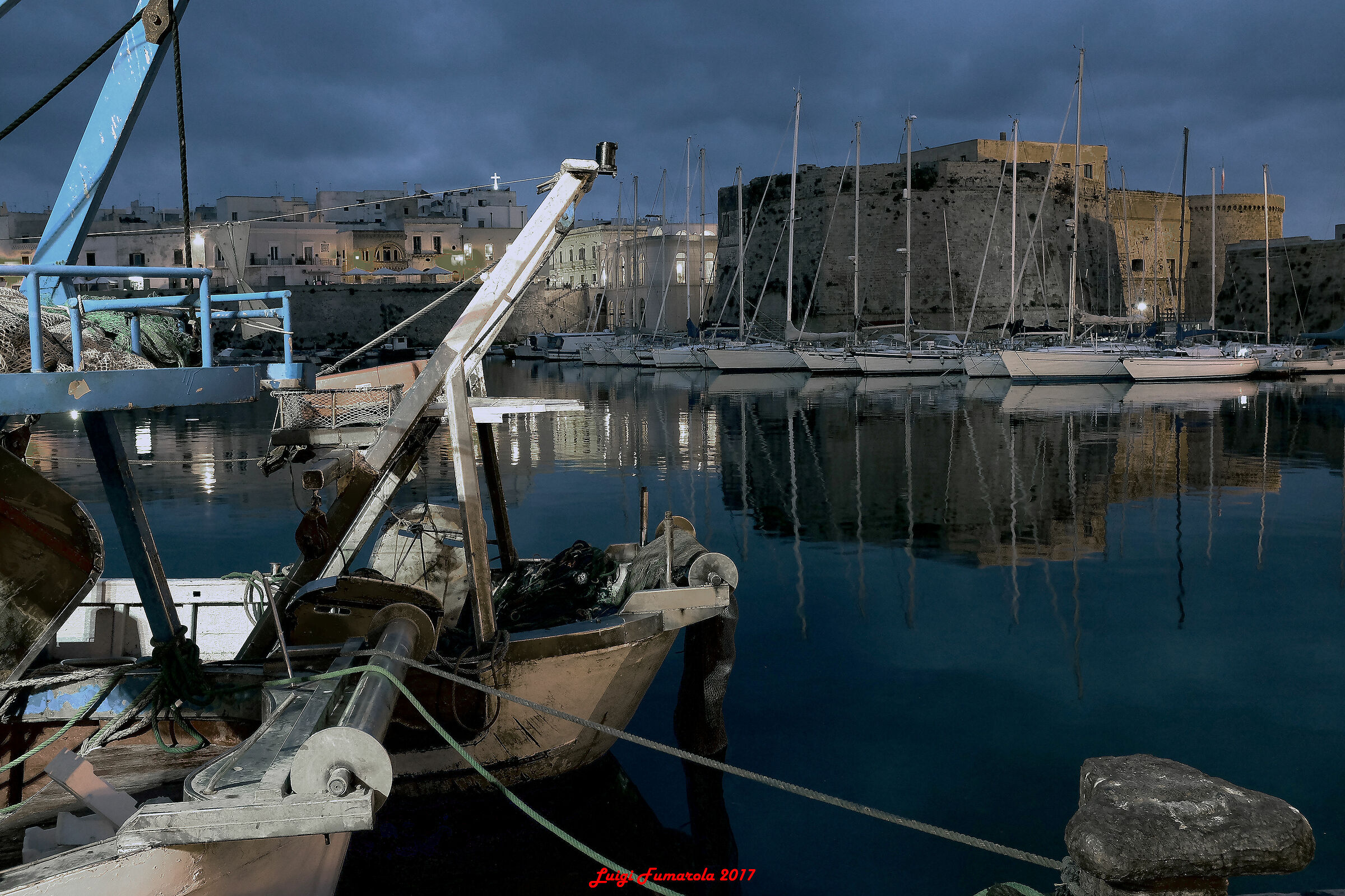 I'm a fishing boat at night.