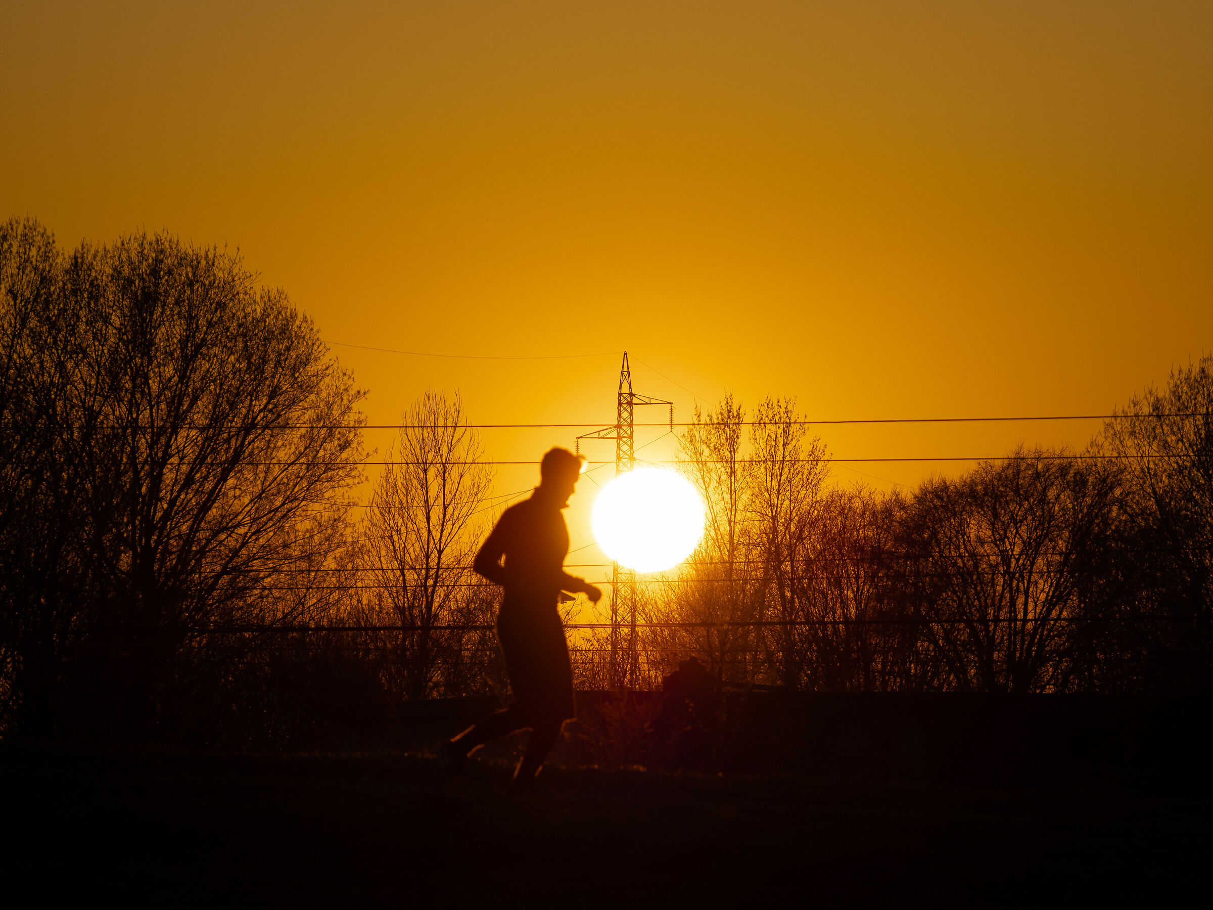 Runner in sunset
