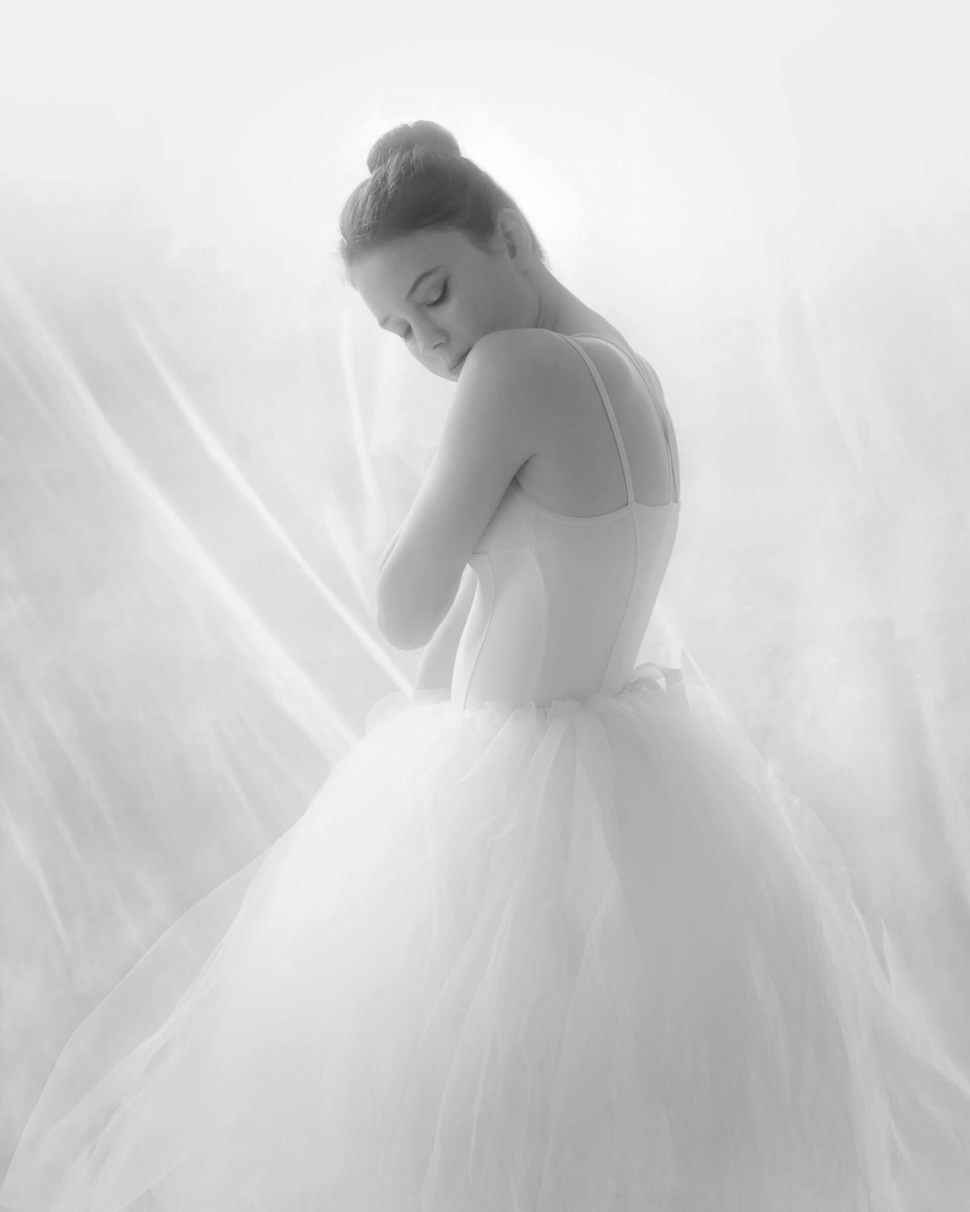 A high-key portrait of a dancer.