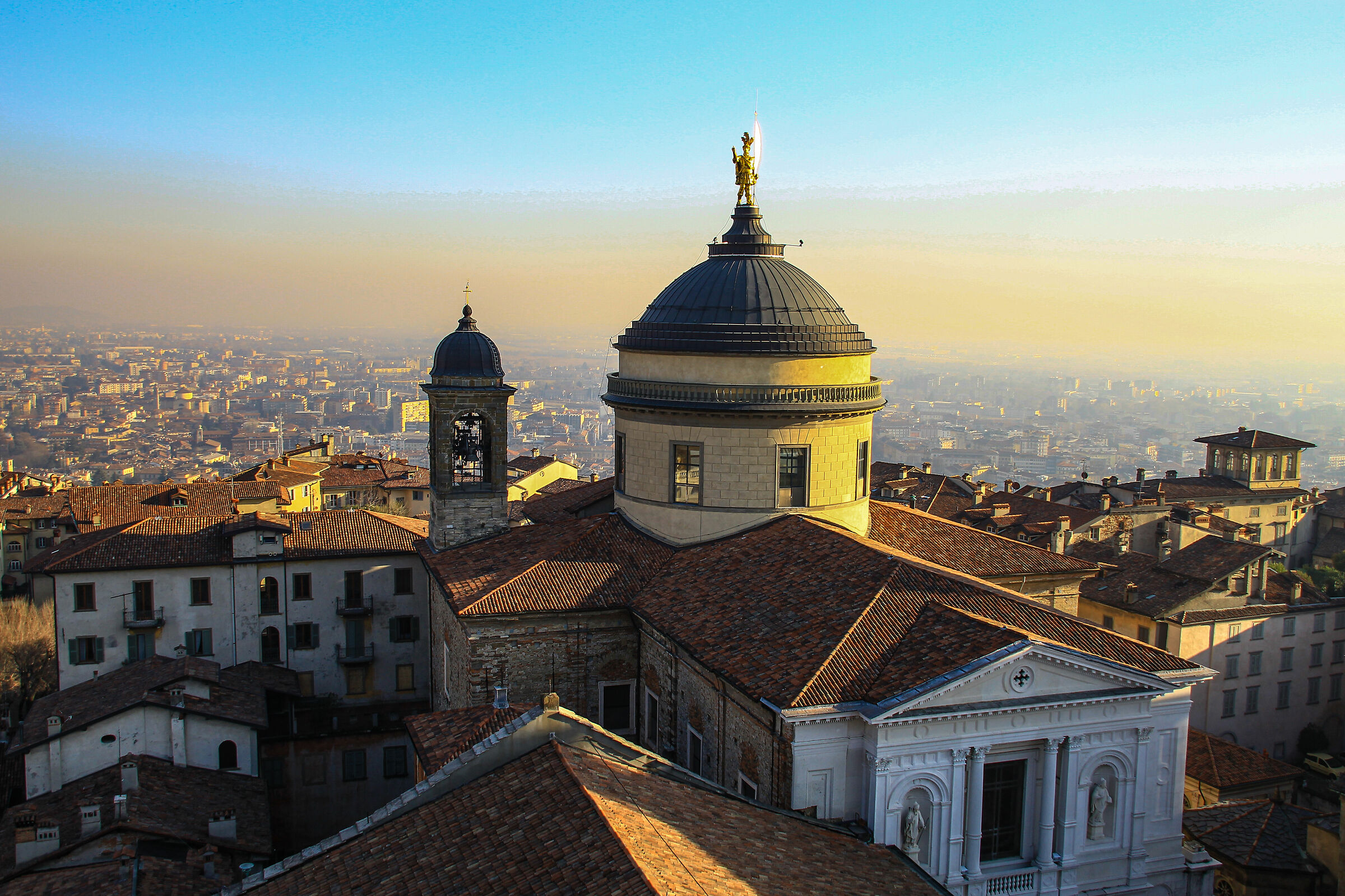 above the rooftops of Bergamo