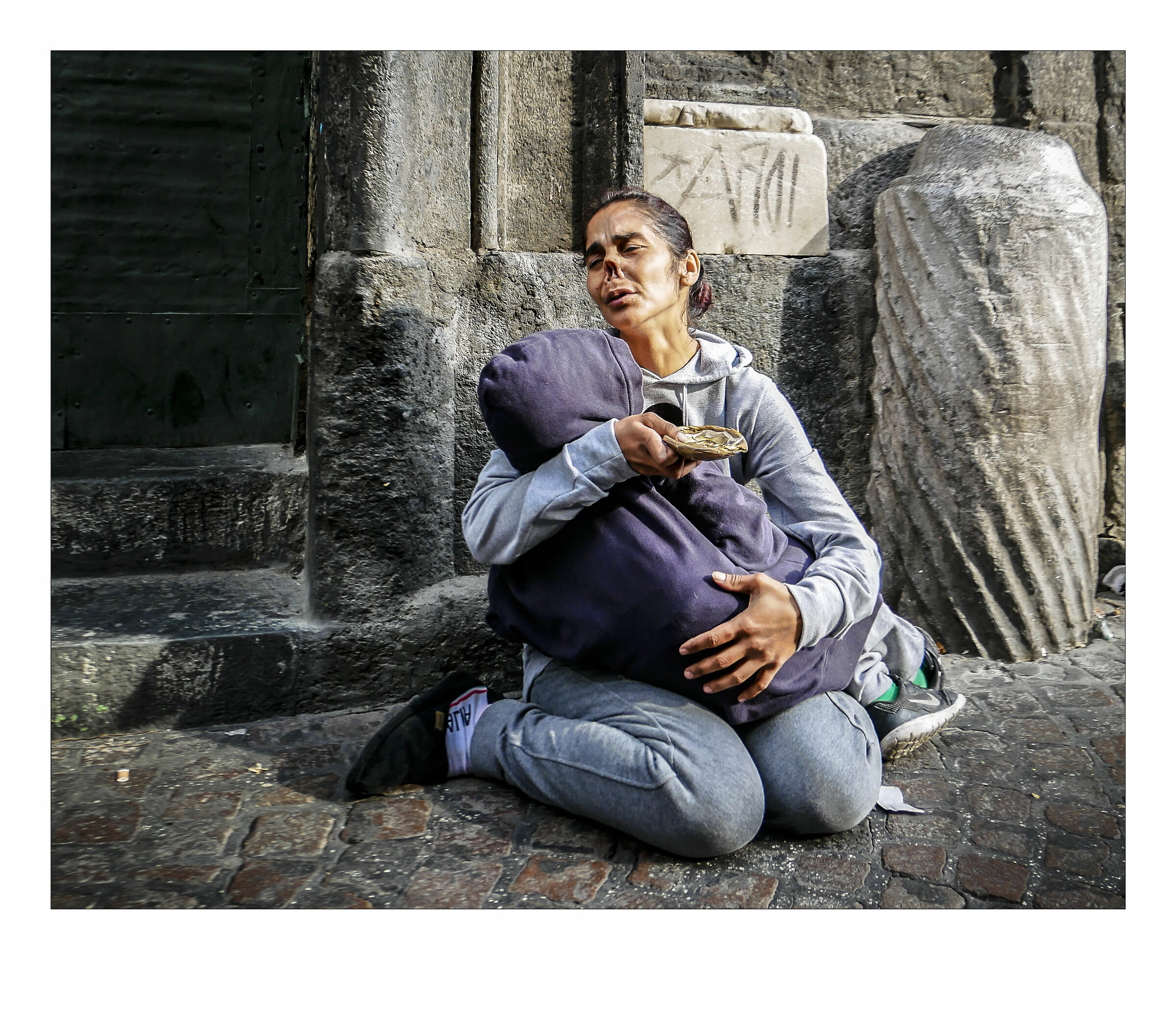 -come la Pietà di Michelangelo-