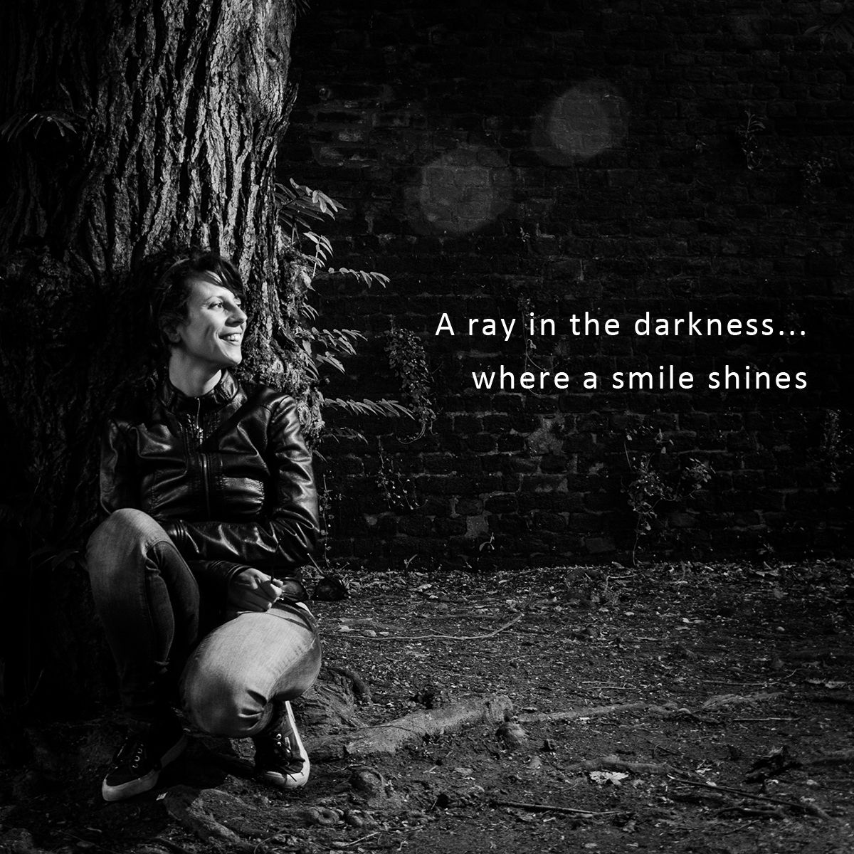 A ray in the darkness where a smile shime