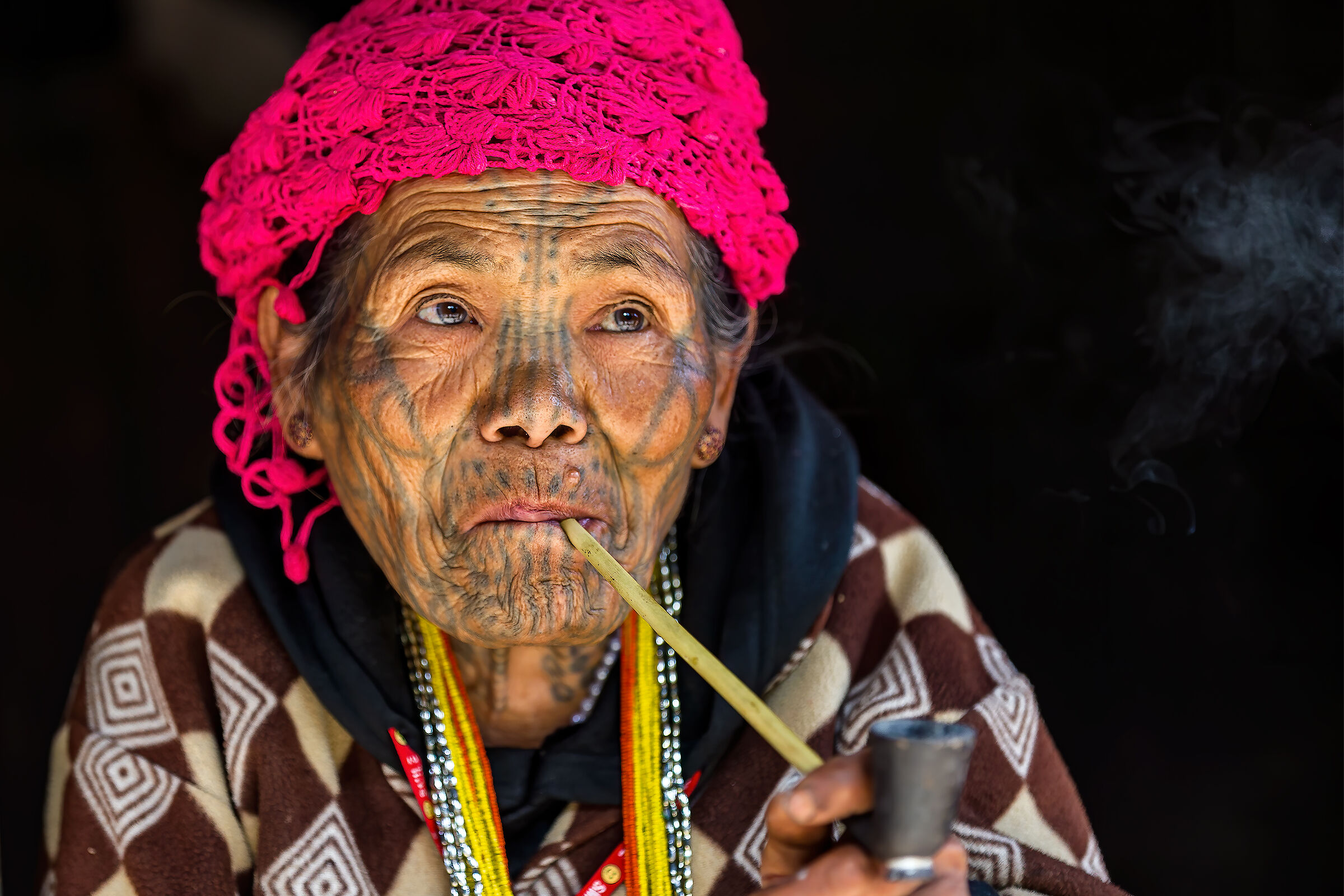 Tattooed faced woman