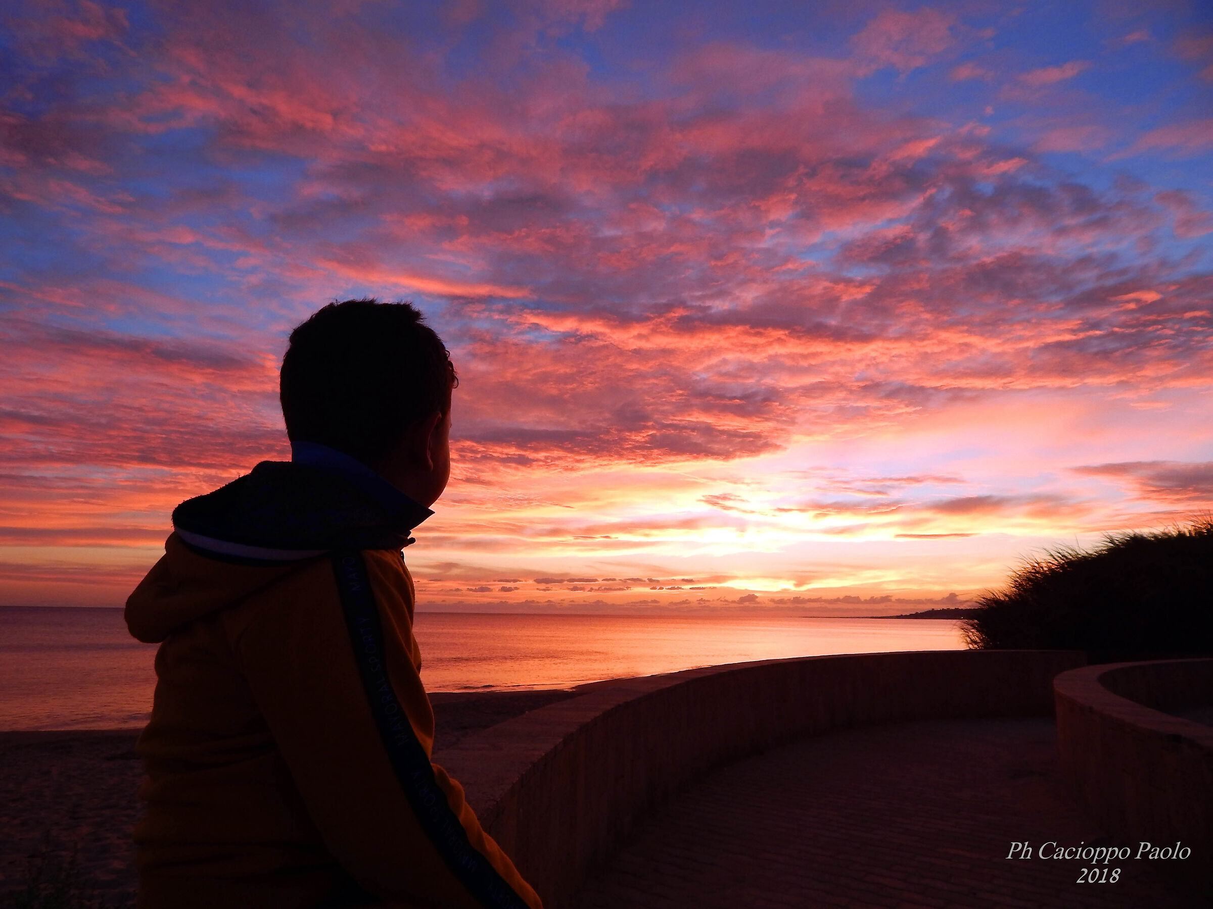 Tramonto con bambino