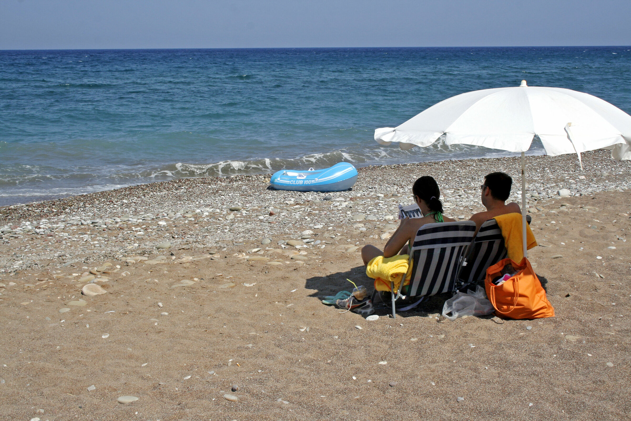 in front of the blue sea