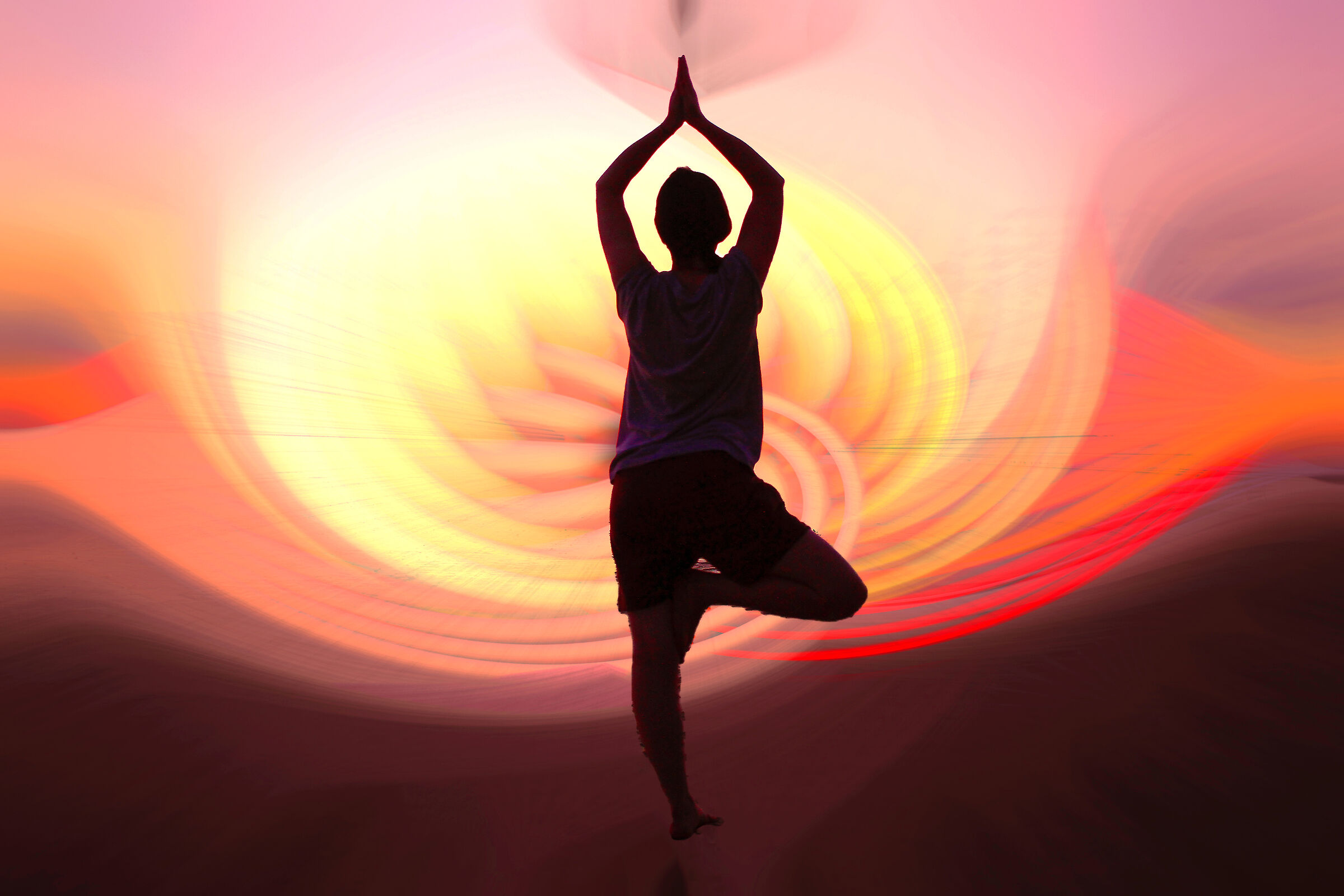 yoga in front of sunset