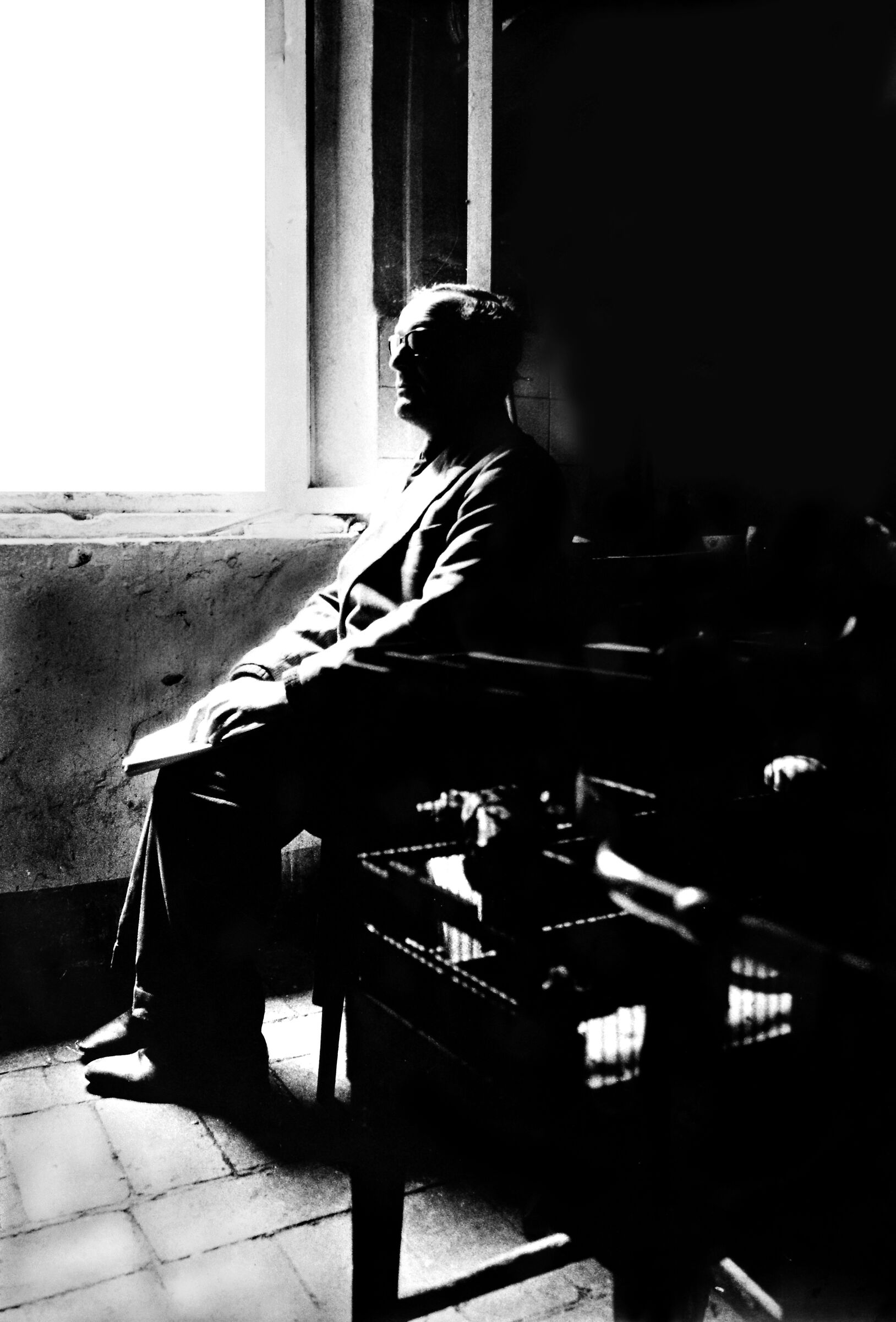 blind man reads the Braille