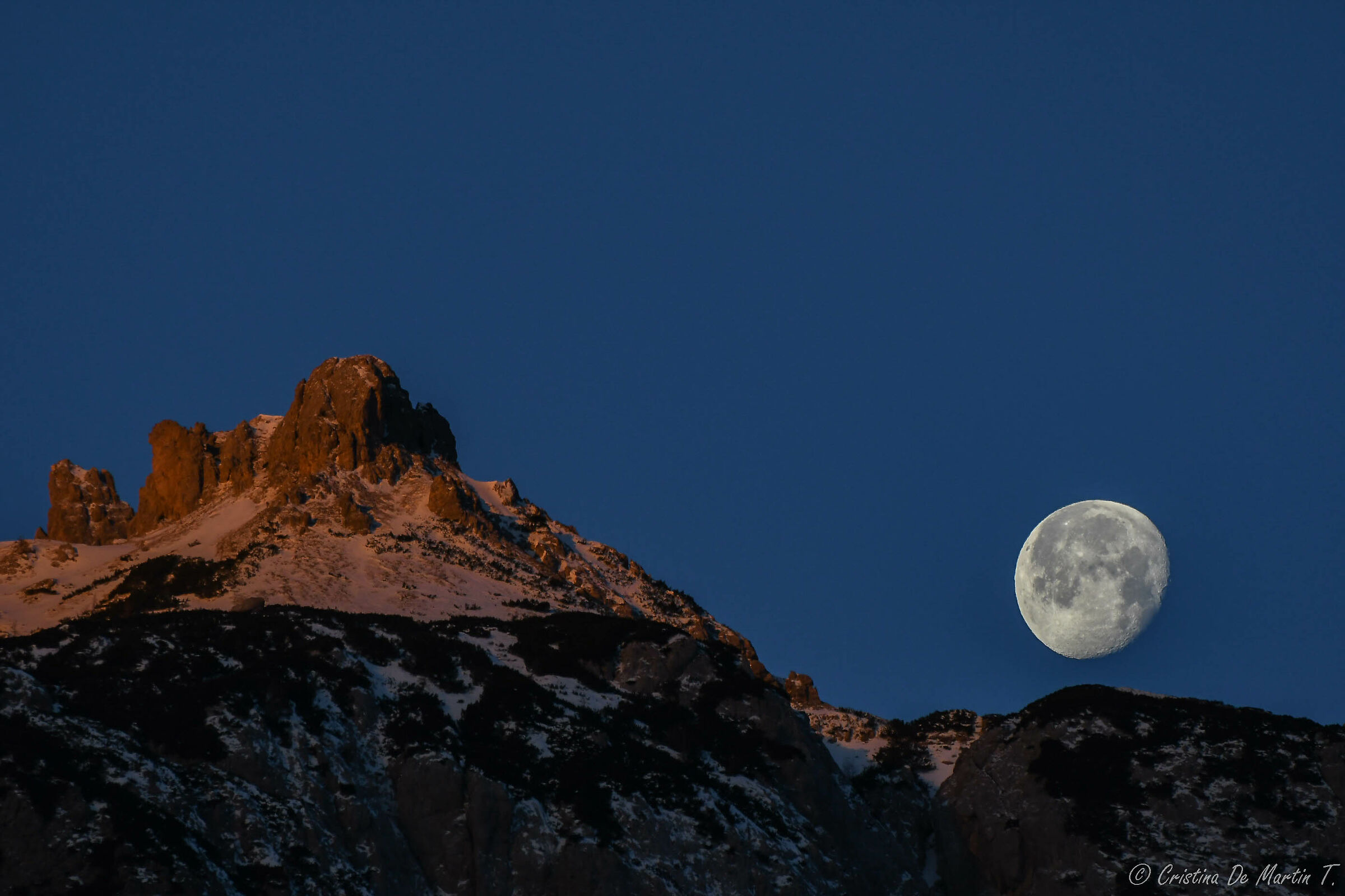 Lunar sunset on the Three Peaks