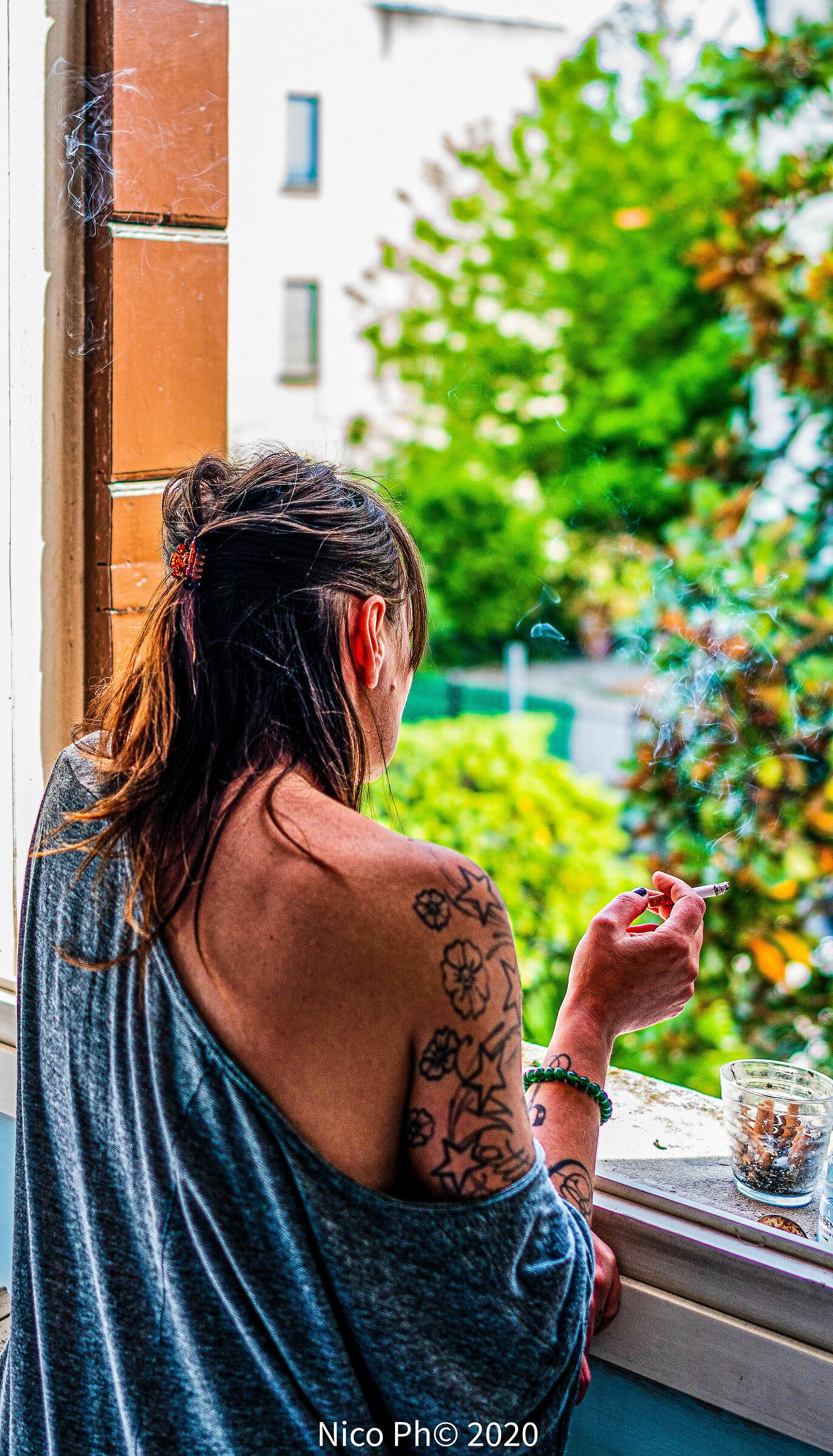 Finestra con tatuaggio