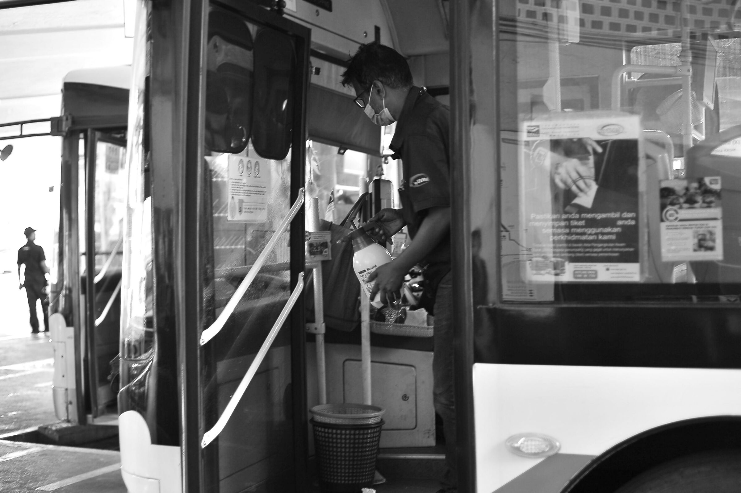 Sanitizing bus interior hand grips